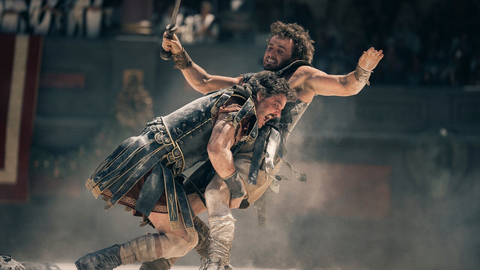 This image released by Paramount Pictures shows Pedro Pascal, left, and Paul Mescal in a scene from "Gladiator II." (Aidan Monaghan/Paramount Pictures via AP)