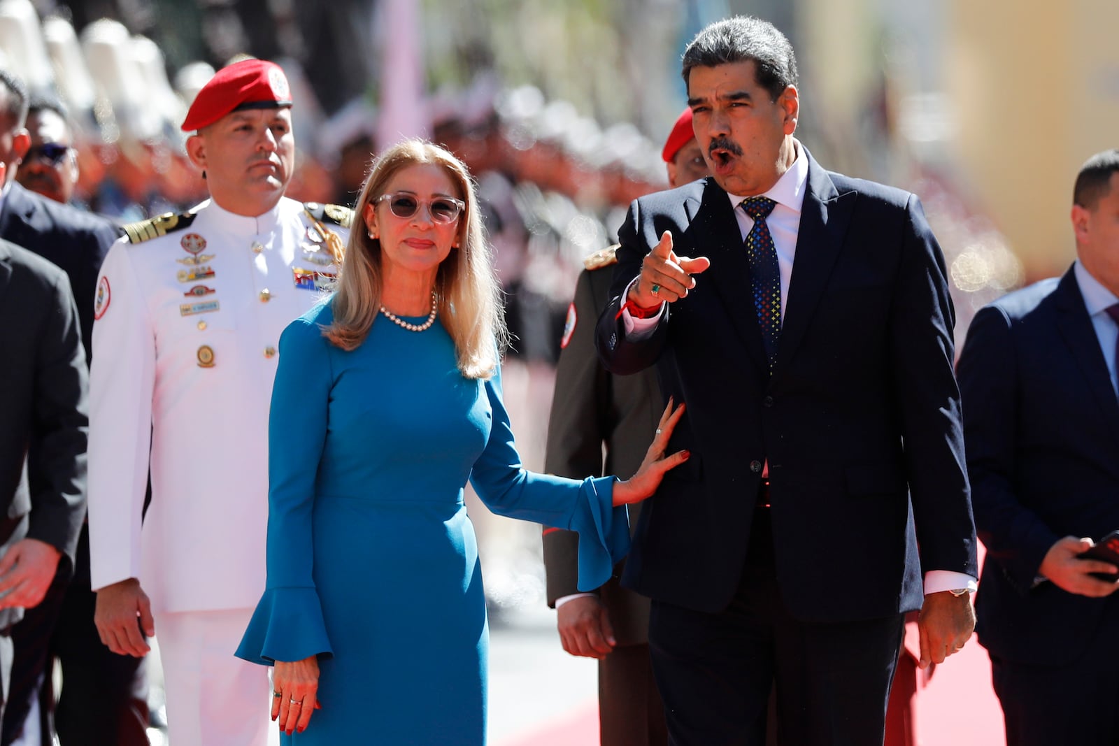 Venezuelan President Nicolas Maduro and his wife Cilia Flores arrive at the National Assembly for his swearing-in ceremony for a third term in Caracas, Venezuela, Friday, Jan. 10, 2025. (AP Photo/Cristian Hernandez)