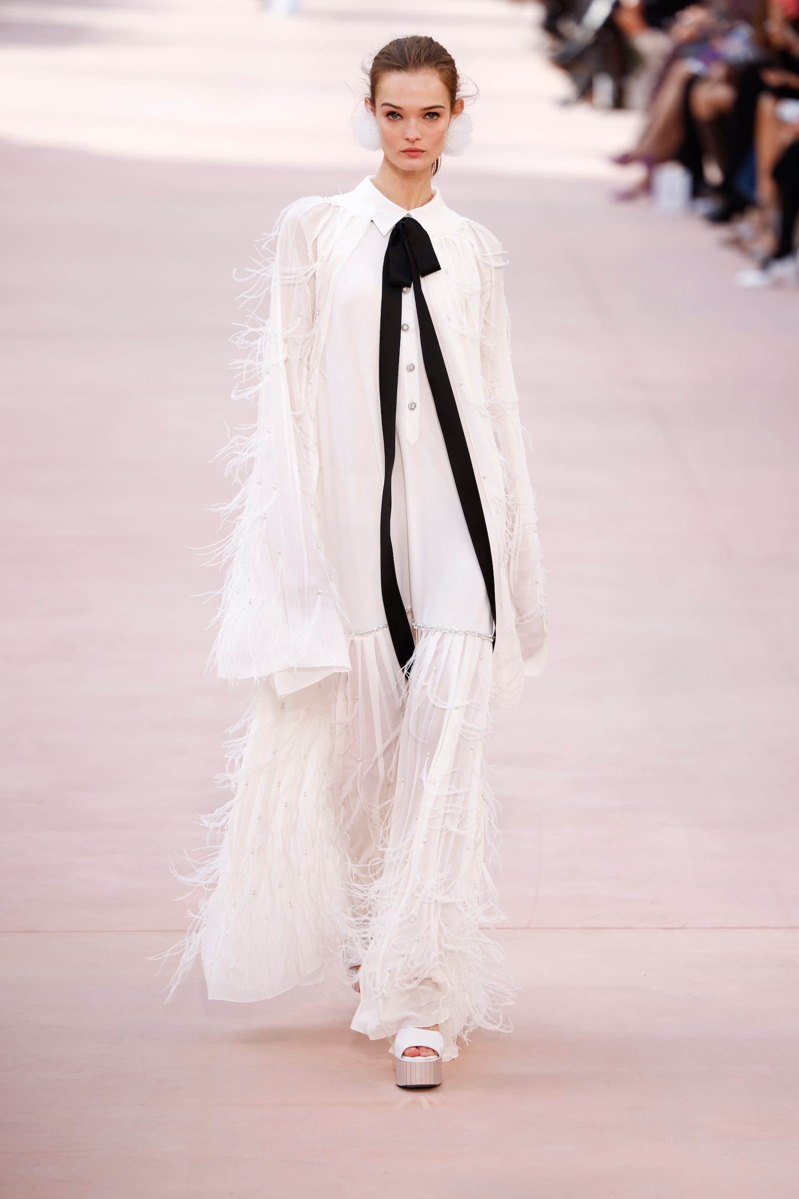 A model wears a creation as part of the Chanel Spring/Summer 2025 collection presented Tuesday, Oct. 1, 2024, in Paris. (Photo by Vianney Le Caer/Invision/AP)