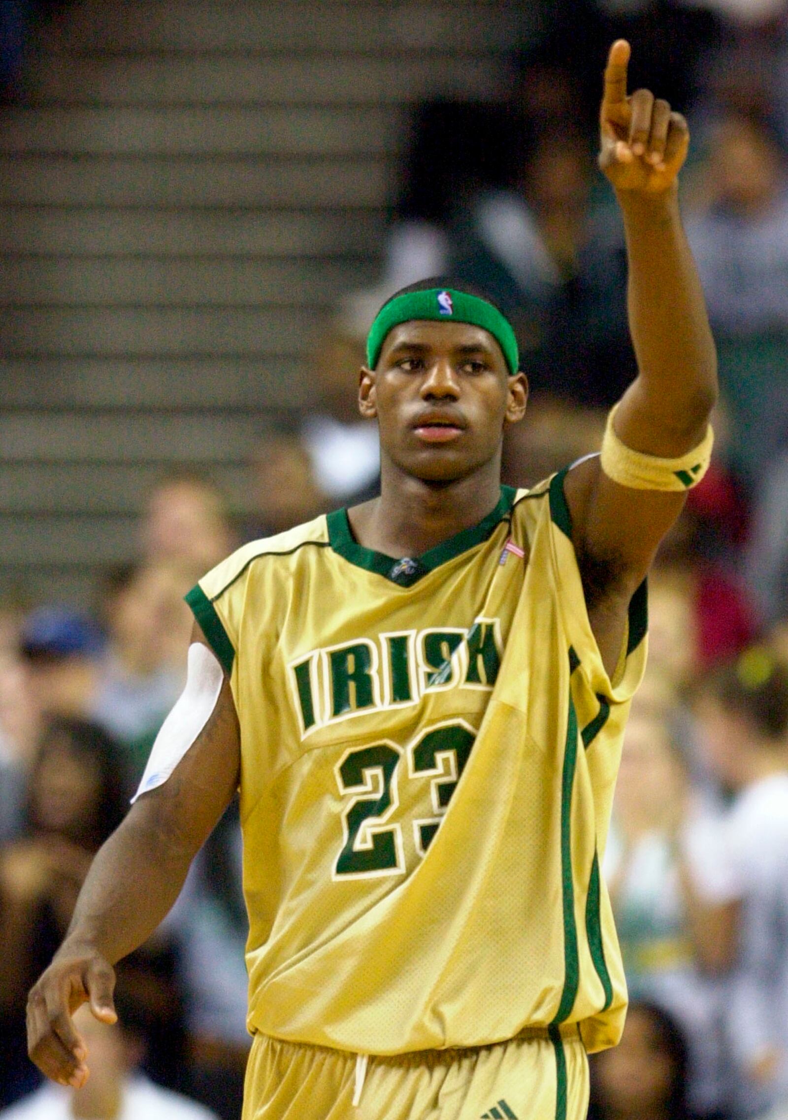 ** FILE ** Akron St. Vincent-St. Marys high school star LeBron James holds up one finger during the team’s 65-45 win over Virginia’s Oak Hill Academy Thursday, Dec. 12, 2002, in Cleveland. James gesture proved prophetic as USA Today named the Irish the top high school basketball team in the country Tuesday, Jan. 7, 2003. (AP Photo/Mark Duncan, File)