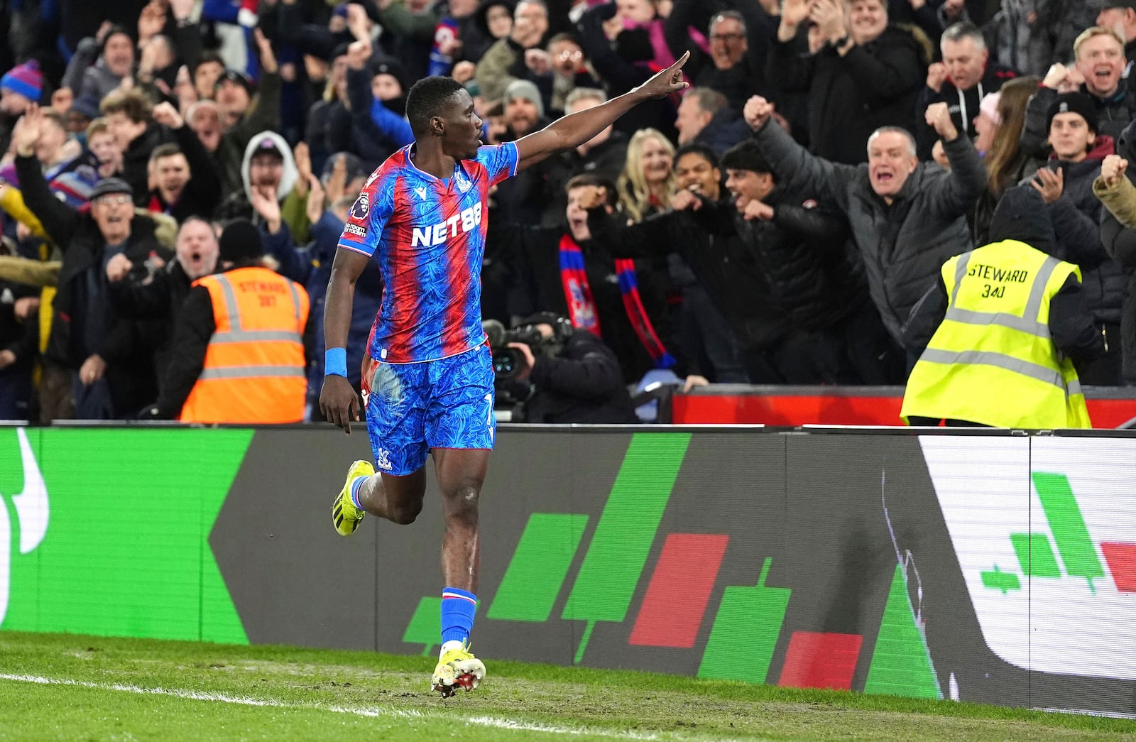 Crystal Palace's Ismaila Sarr celebrates scoring their side's first goal of the game during the English Premier League soccer match between Crystal Palace and Aston Villa at Selhurst Park, London, Tuesday, Feb. 25, 2025. (Zac Goodwin/PA via AP)