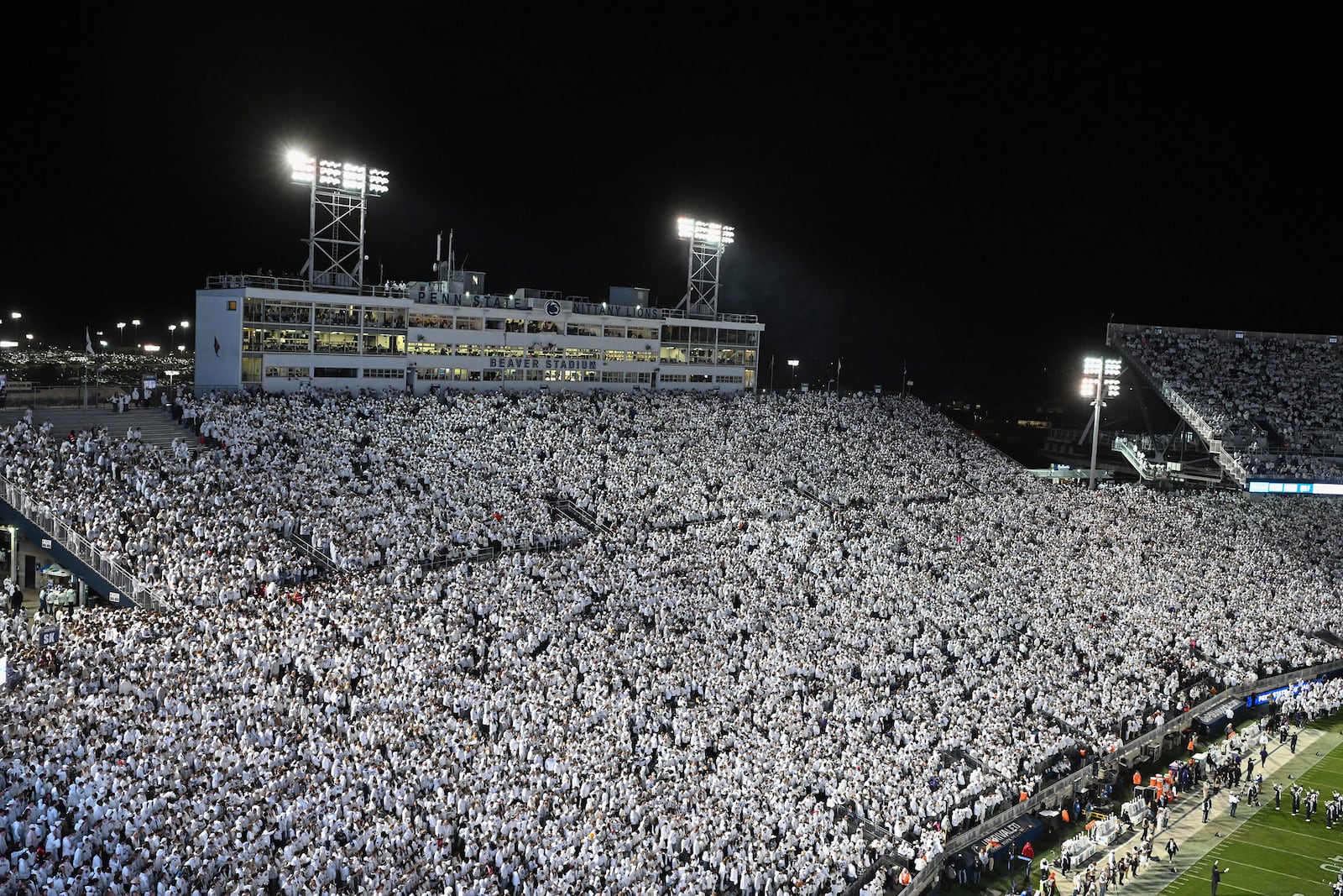 FILE - Penn State takes the field for an NCAA college football game against Washington amidst a "whiteout" crowd at Beaver Stadium, Saturday, Nov. 9, 2024, in State College, Pa. (AP Photo/Barry Reeger, File)