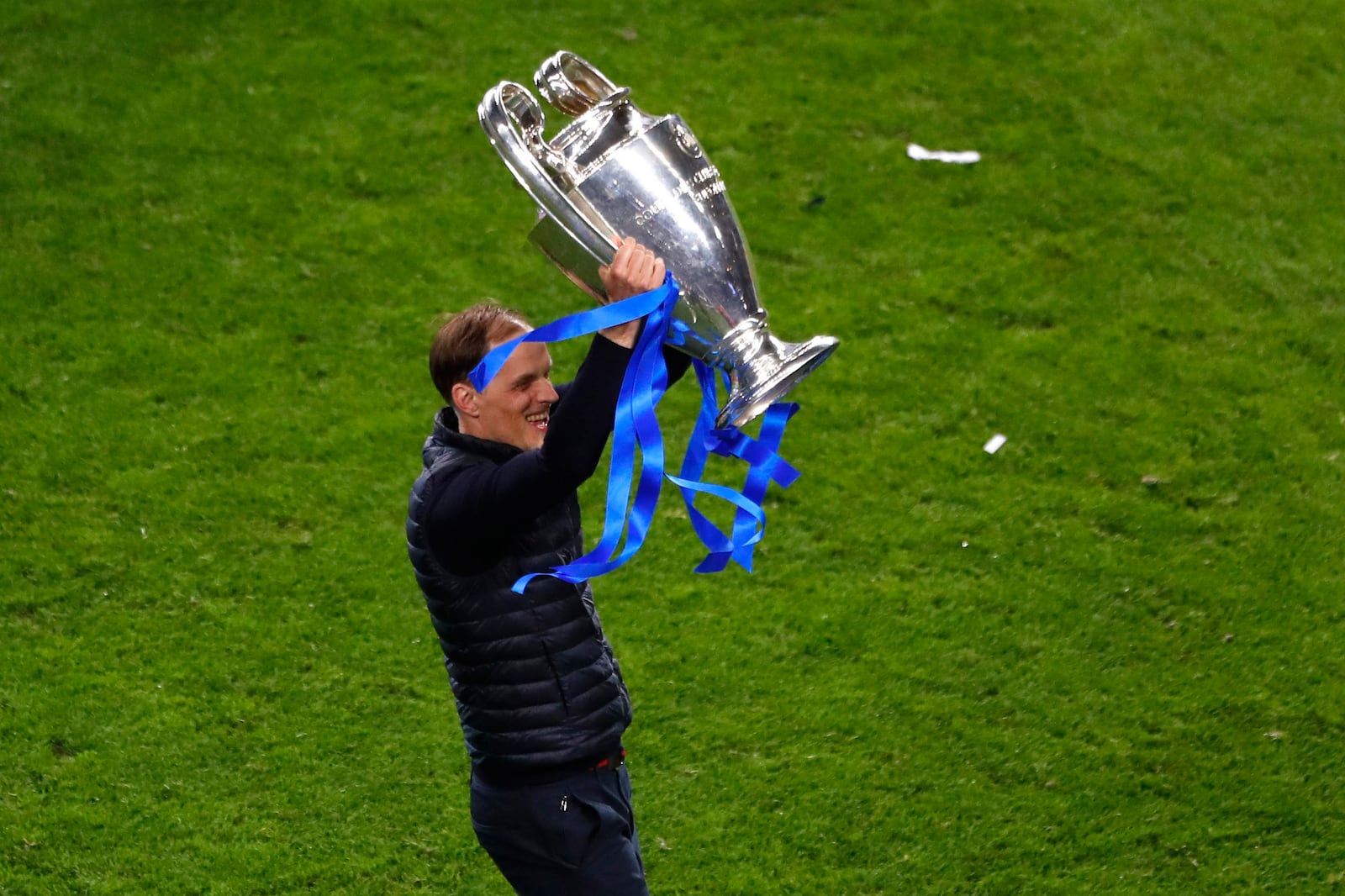 FILE - Chelsea's head coach Thomas Tuchel celebrates with the trophy after winning the Champions League final soccer match against Manchester City at the Dragao Stadium in Porto, Portugal, Saturday, May 29, 2021. (Susana Vera/Pool via AP, File)