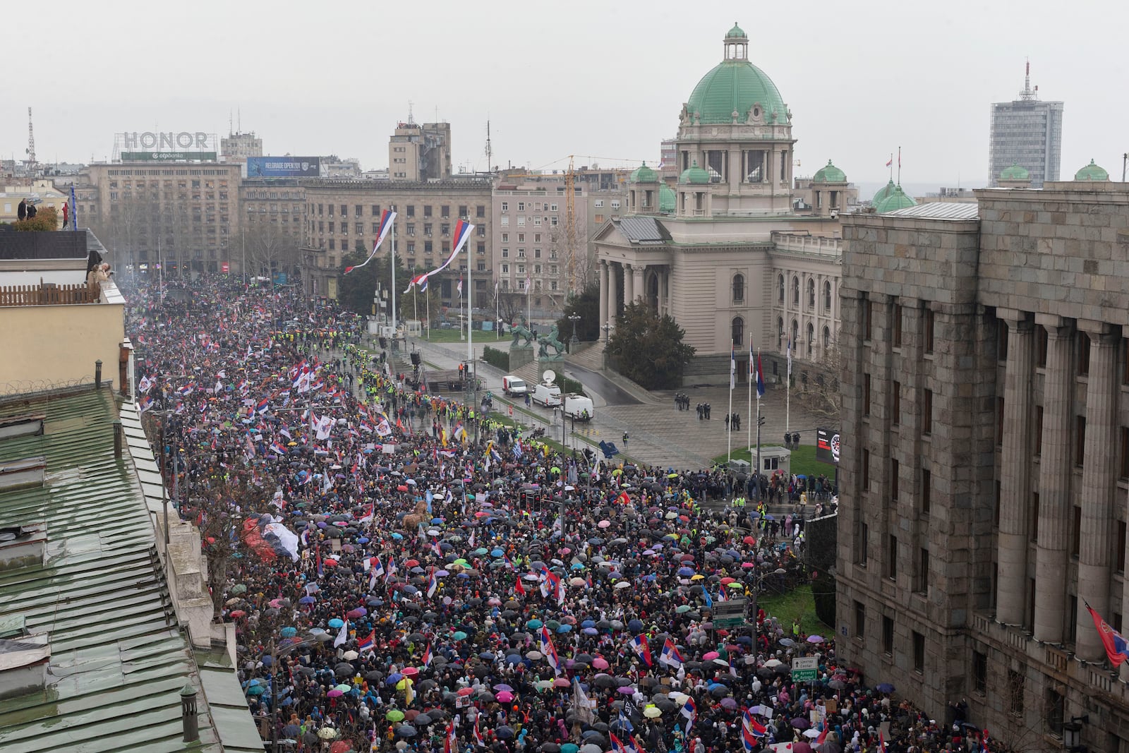 Tens of thousands gather in front of the Serbian parliament during a major anti-corruption rally led by university students in Belgrade, Serbia, Saturday, March 15, 2025. (AP Photo/Marko Drobnjakovic)