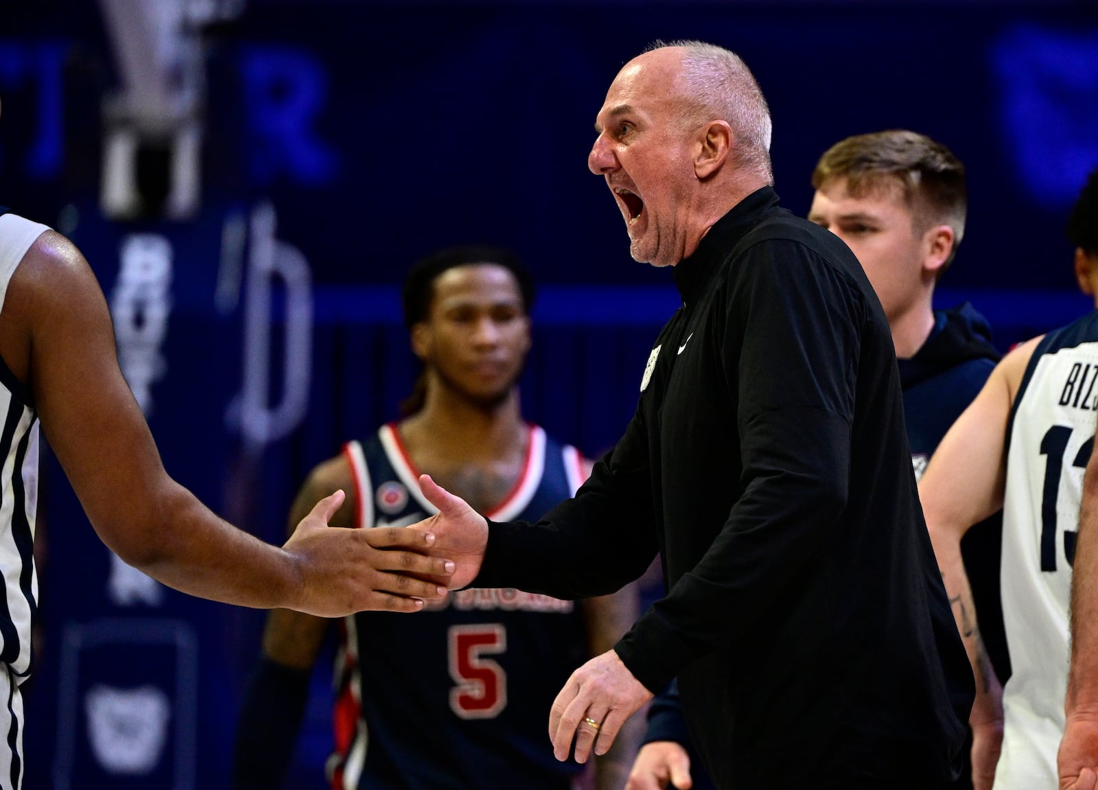 Butler head coach Thad Matta high-fives forward Pierre Brooks II during the second half of an NCAA college basketball game, Wednesday, Feb. 26, 2025, in Indianapolis, Ind. (AP Photo/Marc Lebryk)