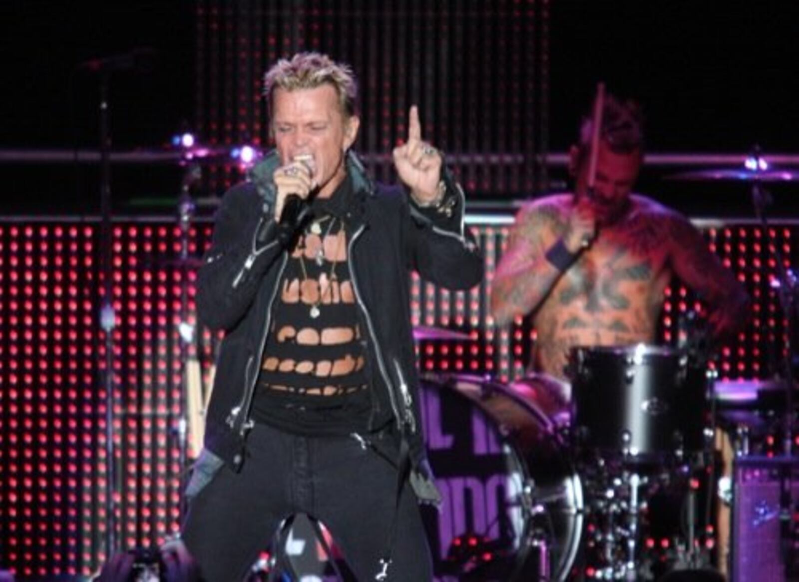 Billy Idol rocked the Fraze in Kettering in 2010 and he will be returning to rock the Rose Music Center at the Heights on Aug. 3 this year. STAFF PHOTO