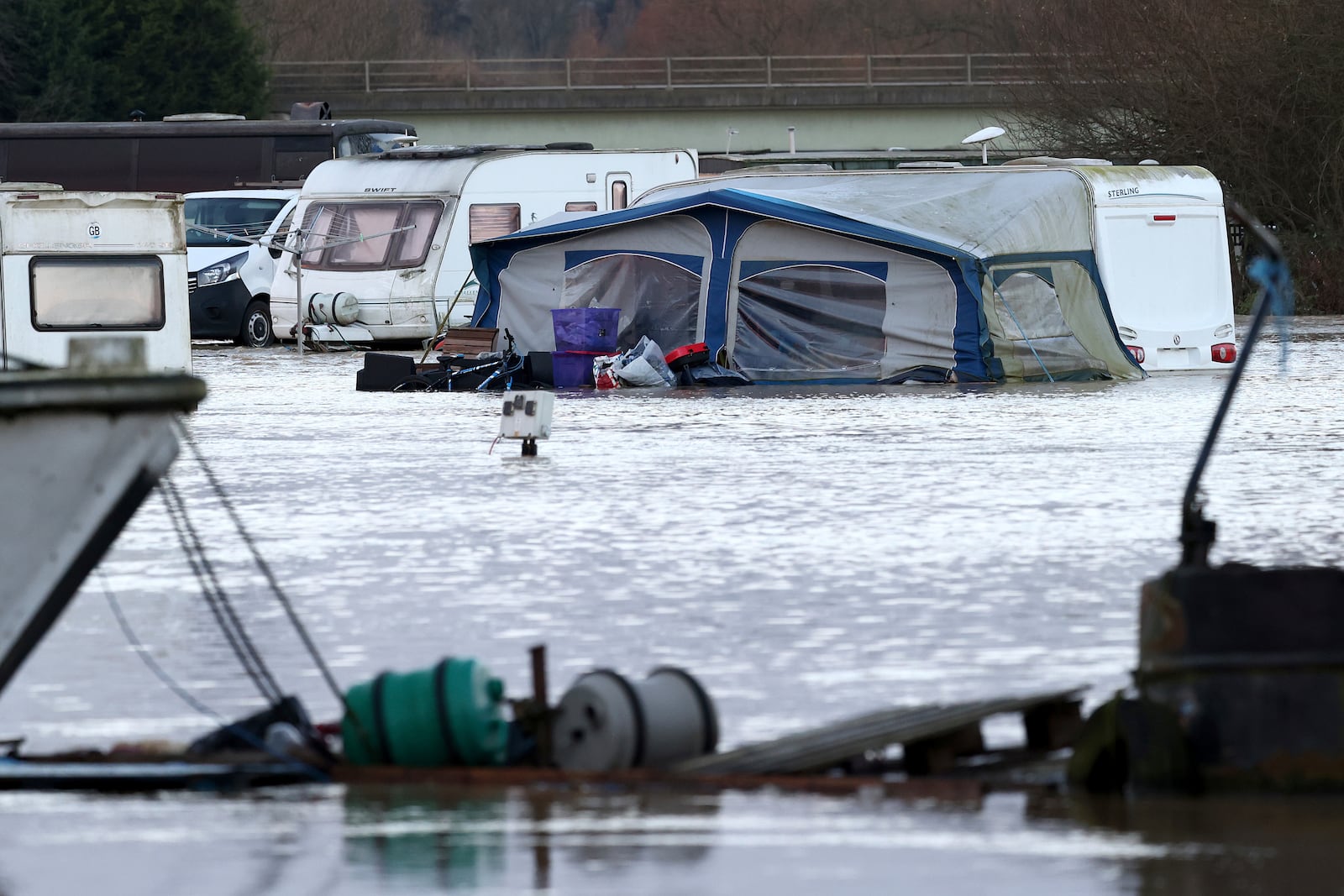 A tent sits in the floods of the river Soar at the caravan parks in Barrow Upon Soar, England, Tuesday, Jan. 7, 2025.(AP Photo/Darren Staples)