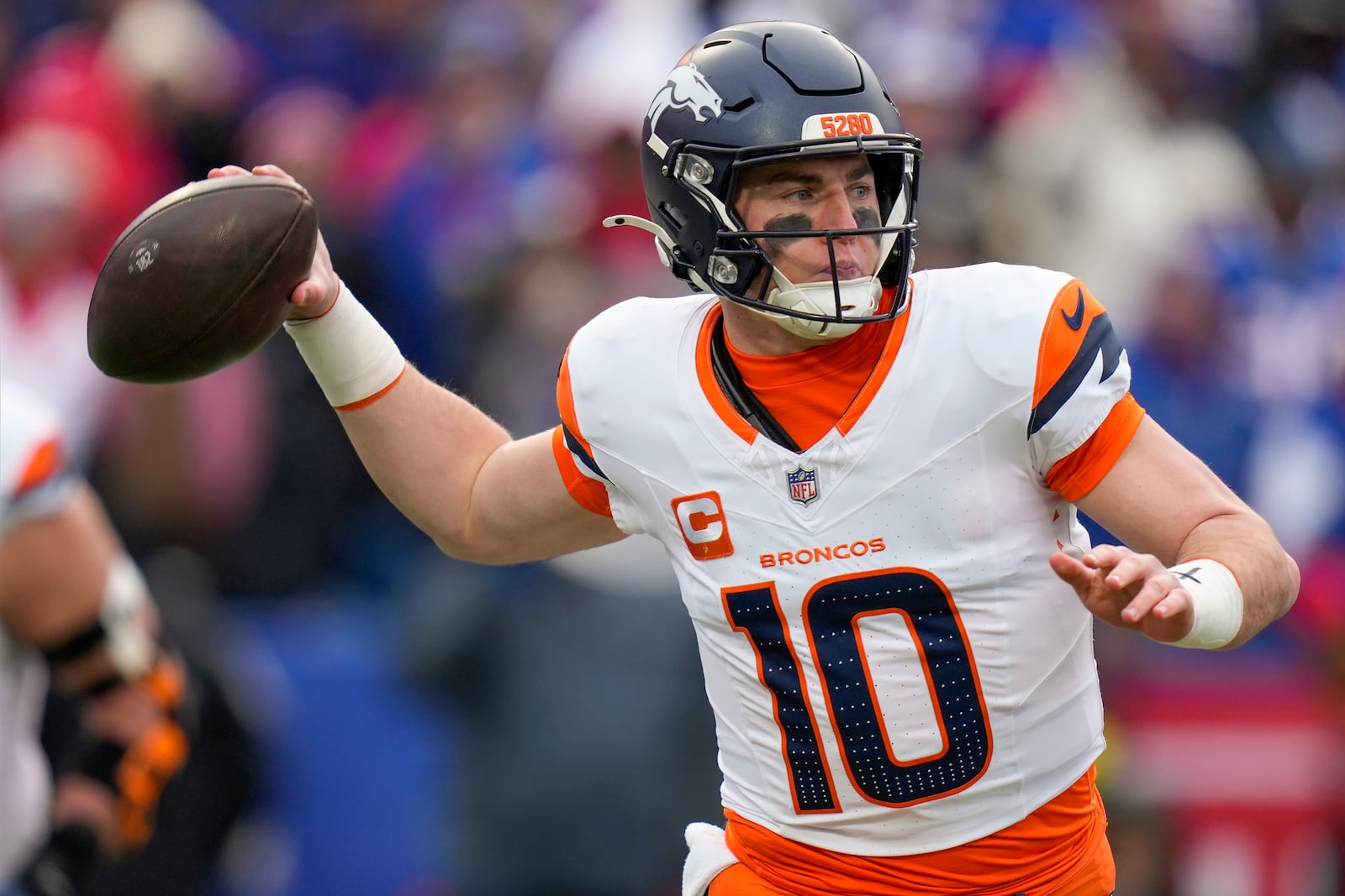 Denver Broncos quarterback Bo Nix (10) passes against the Buffalo Bills during the second quarter of an NFL wild card playoff football game, Sunday, Jan. 12, 2025, in Orchard Park, N.Y. (AP Photo/Seth Wenig)