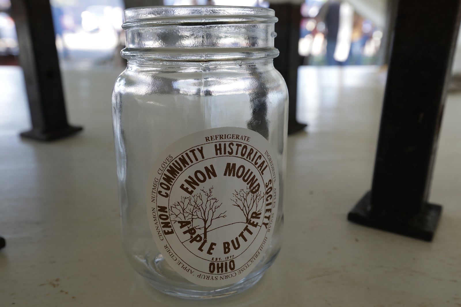 A mason jar waits to be filled up with hot apple butter Saturday at the Apple Butter Festival. BILL LACKEY/STAFF