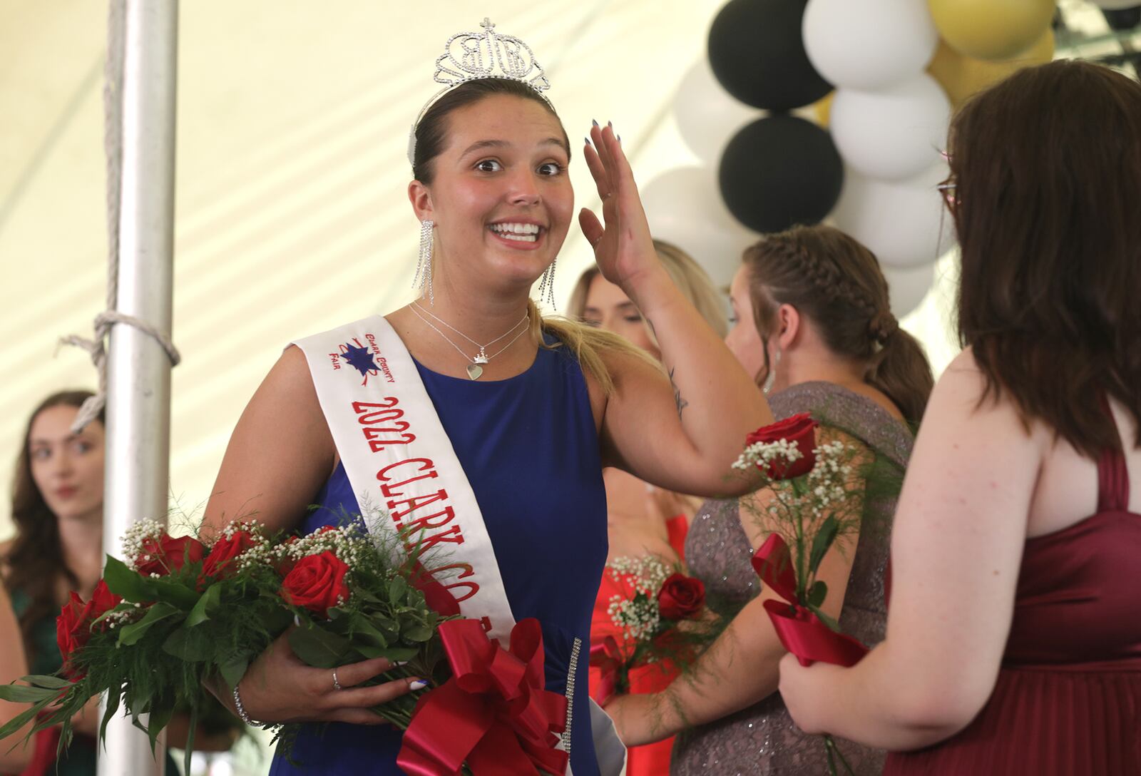 Rebekah Hardacre seems in disbelief after she was crowned the 2022 Clark County Fair Queen Friday, July 22, 2022. BILL LACKEY/STAFF