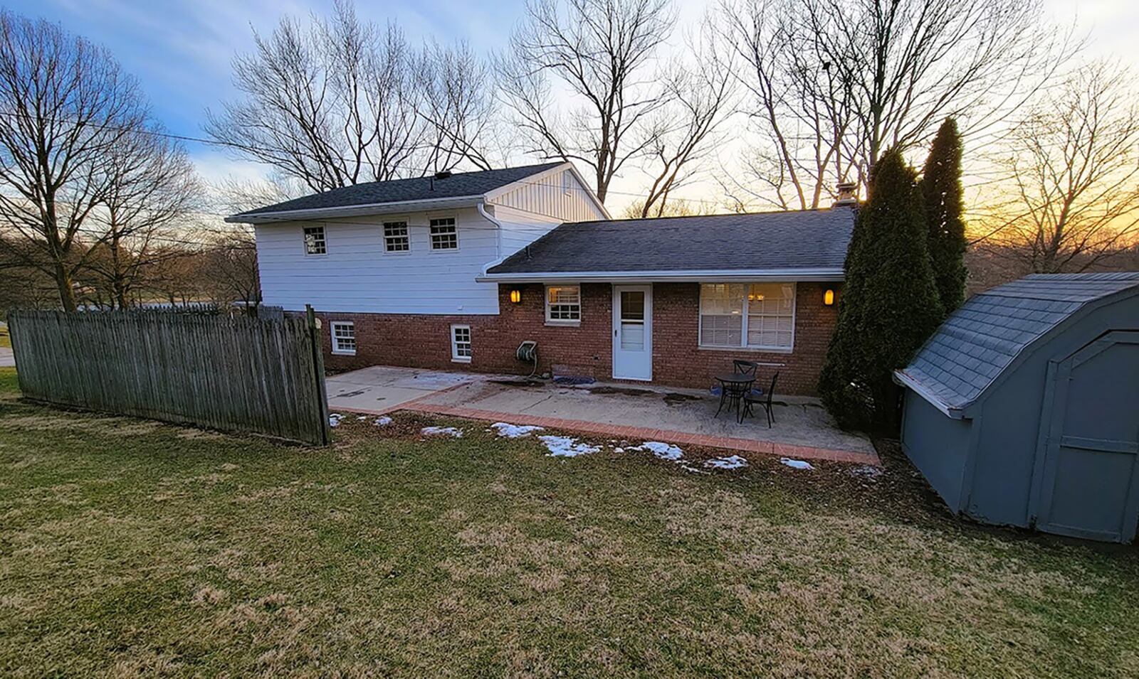 The rear of the property has a stamped concrete patio, partial privacy fence and yard barn. CONTRIBUTED PHOTO