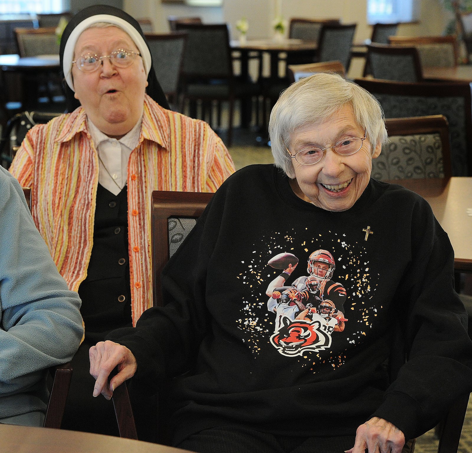 Sisters of Precious Blood of Dayton,  Jane Francis Hoffman, left, and Margie Zureick talk Wednesday Feb. 9, 2022 about the Bengals and the Super Bowl. Both are big Bengals fans and plan to cheer on Cincinnati in the Super Bowl Sunday. MARSHALL GORBY\STAFF