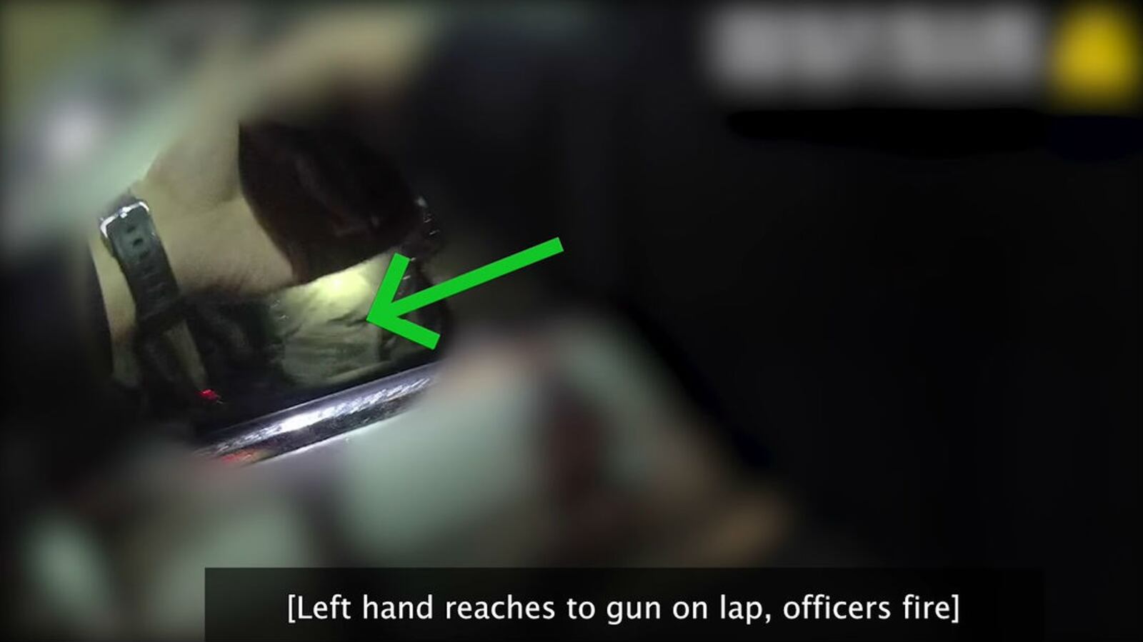 The green arrow points to where Vallejo, California, police officials allege Willie McCoy, 20, is reaching for a gun in his lap as as he sits in his silver Mercedes in the drive-thru of a Taco Bell the night of Feb. 9, 2019. Six officers opened fire on McCoy, an aspiring rapper, moments after McCoy, who had fallen asleep at the wheel, awoke and started moving.