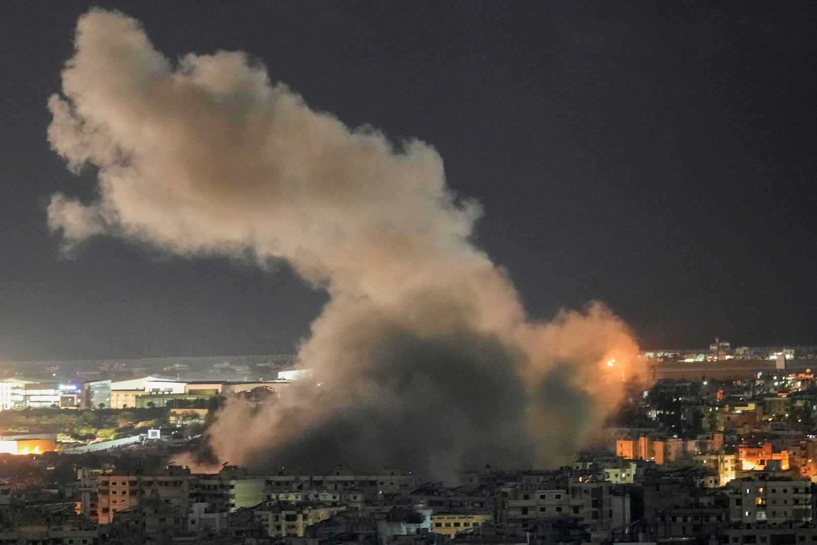 Smoke rises from an Israeli airstrike on Dahiyeh, in the southern suburb of Beirut, Tuesday, Oct. 22, 2024. (AP Photo/Bilal Hussein)