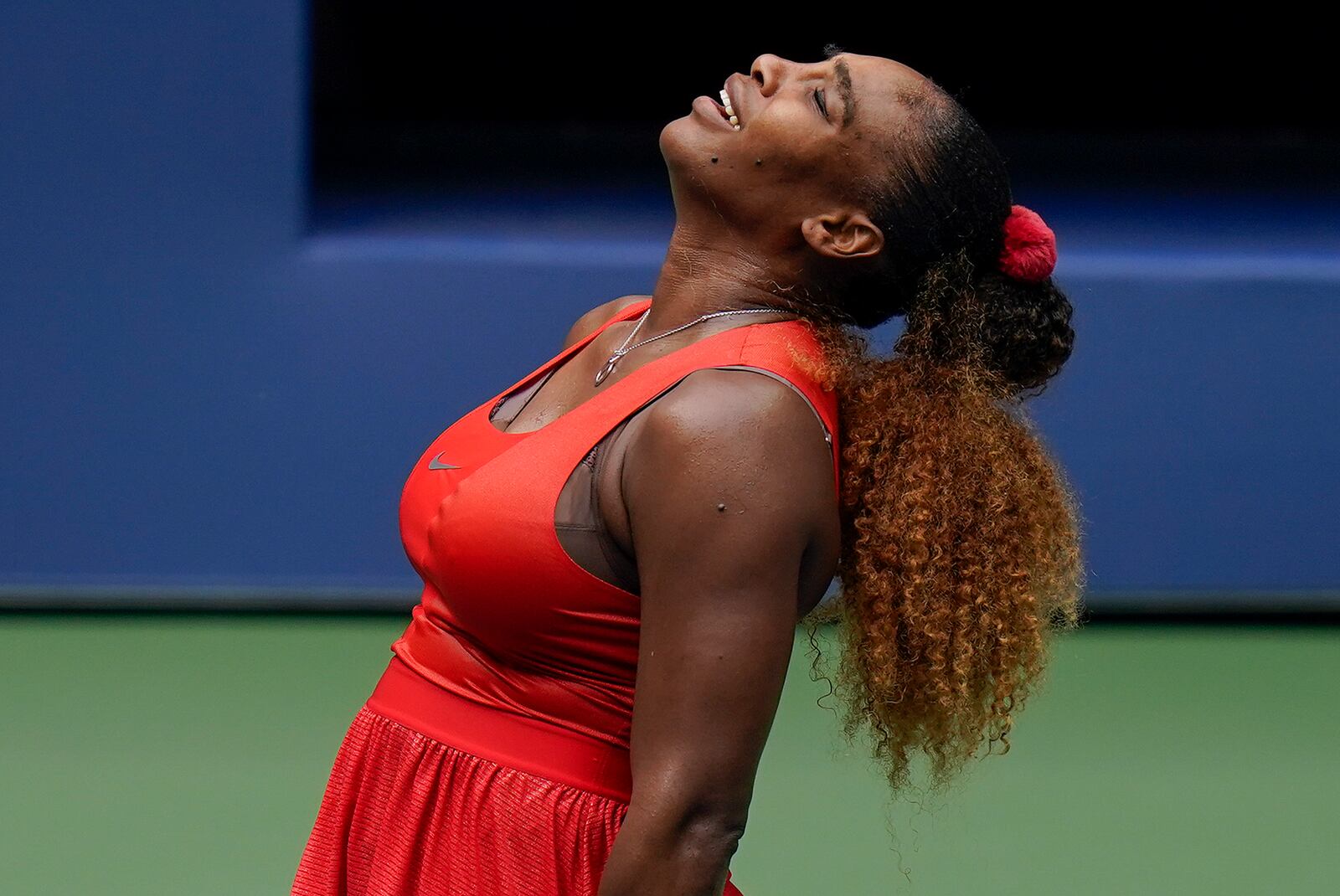 Serena Williams, of the United States, reacts during a match against Tsvetana Pironkova, of Bulgaria, during the quarterfinals of the US Open tennis championships, Wednesday, Sept. 9, 2020, in New York. (AP Photo/Seth Wenig)