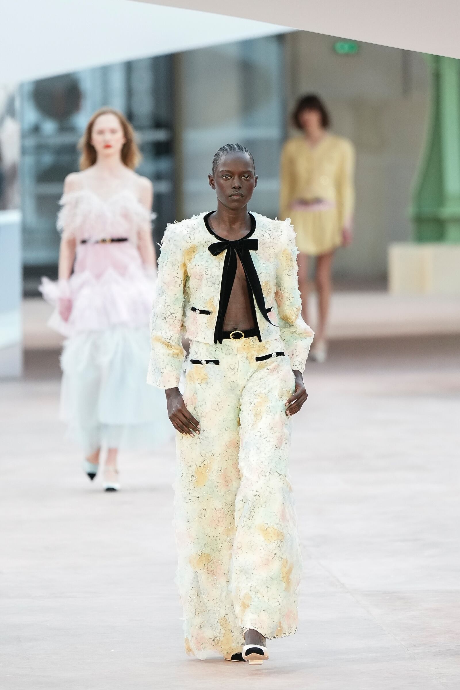 A model wears a creation as part of the Chanel Haute Couture Spring Summer 2025 collection, that was presented in Paris, Tuesday, Jan. 28, 2025. (AP Photo/Lewis Joly).