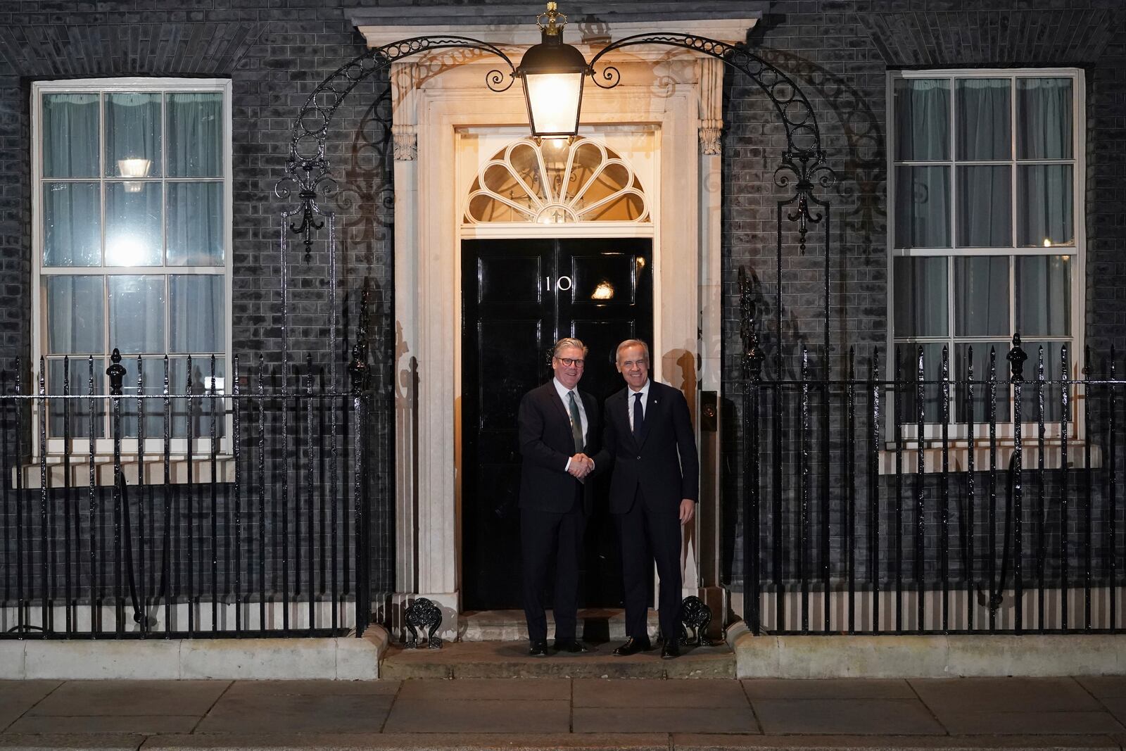 Britain's Prime Minister Keir Starmer welcomes Canada's Prime Minister Mark Carney to 10 Downing Street in London, Monday, March 17, 2025.(AP Photo/Alberto Pezzali)