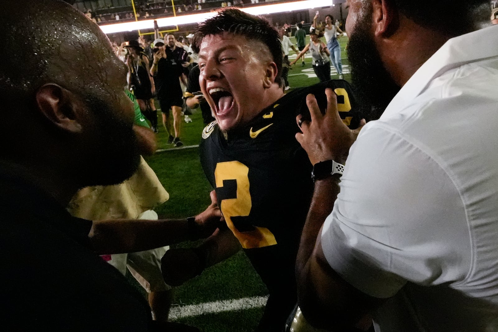 Vanderbilt quarterback Diego Pavia (2) celebrates the team's 40-35 win against Alabama after an NCAA college football game Saturday, Oct. 5, 2024, in Nashville, Tenn. (AP Photo/George Walker IV)