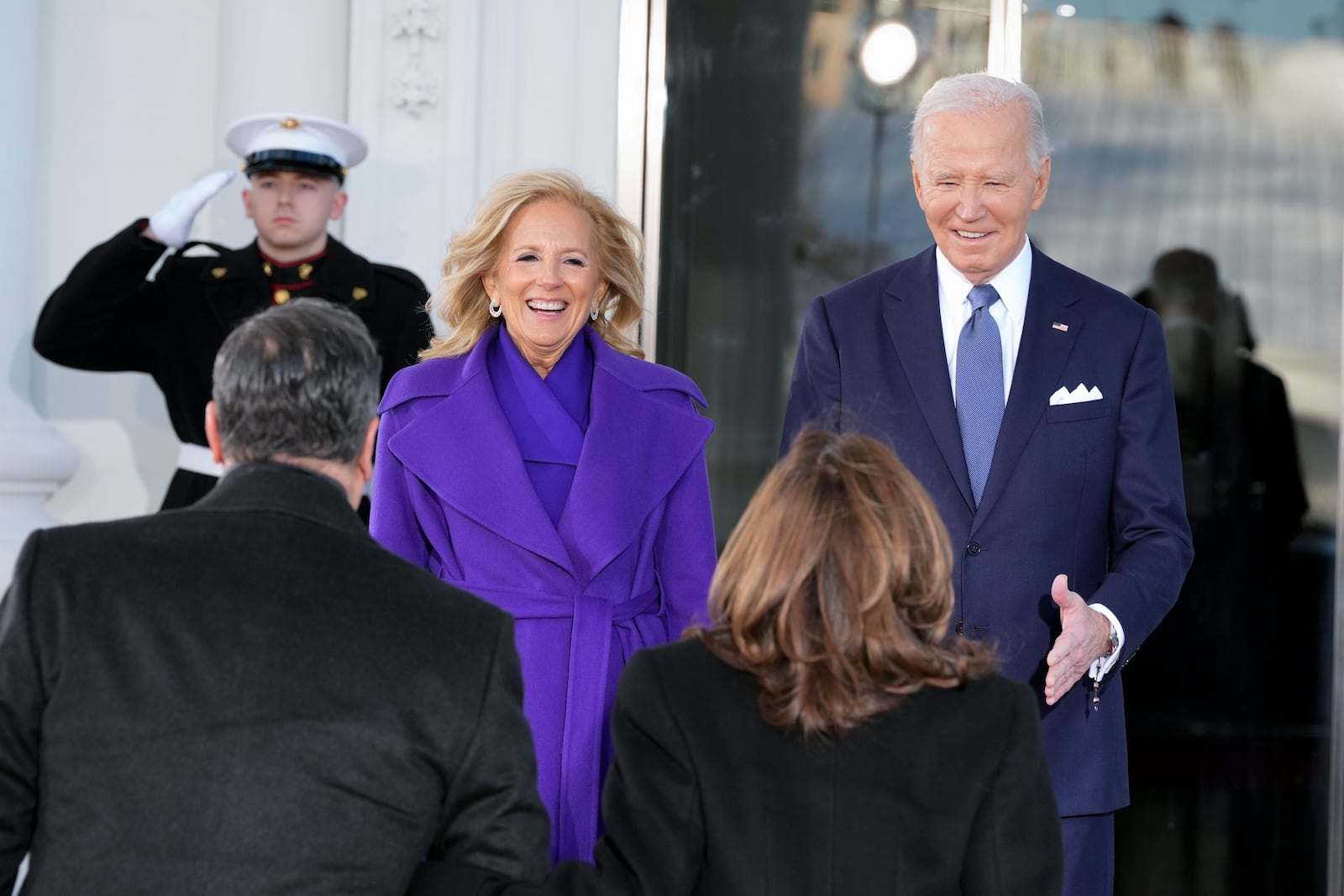 President Joe Biden and first lady Jill Biden greet Vice President Kamala Harris and second gentleman Doug Emhoff upon their arrival at the White House, Monday, Jan. 20, 2025, in Washington. (AP Photo/Alex Brandon)