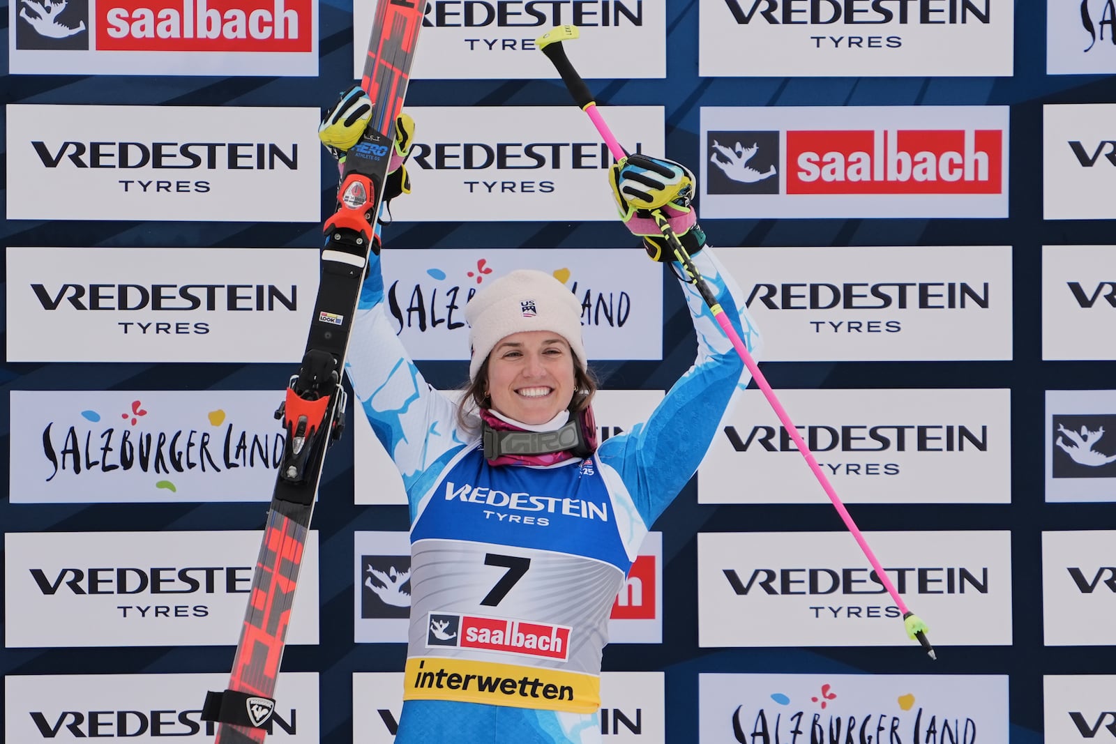 United States' Paula Moltzan celebrates on the podium after winning the bronze medal in a women's giant slalom, at the Alpine Ski World Championships, in Saalbach-Hinterglemm, Austria, Thursday, Feb. 13, 2025. (AP Photo/Giovanni Auletta)