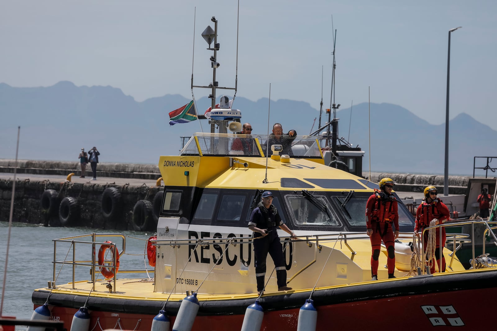 Britain's Prince William, the Prince of Wales, arrives on board a National Sea Rescue Institute (NSRI) boat to meet 2023 Earthshot finalist ABALOBI, at Kalk Bay Harbour, near Cape Town, Thursday, Nov. 7, 2024. (Gianluigi Guercia/Pool Photo via AP)