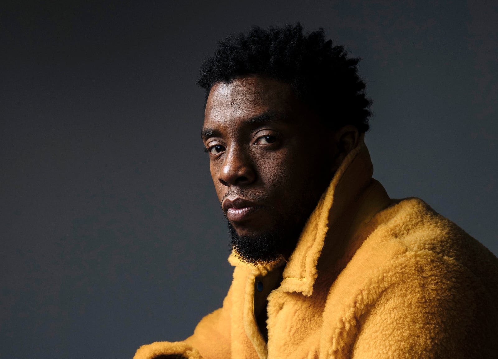 FILE - In this Feb. 14, 2018 photo, actor Chadwick Boseman poses for a portrait in New York to promote his film, "Black Panther." Boseman, who played Black icons Jackie Robinson and James Brown before finding fame as the regal Black Panther in the Marvel cinematic universe, has died of cancer Aug. 28, 2020 in Los Angeles after a four-year battle with colon cancer. He was 43. (Photo by Victoria Will/Invision/AP, File)