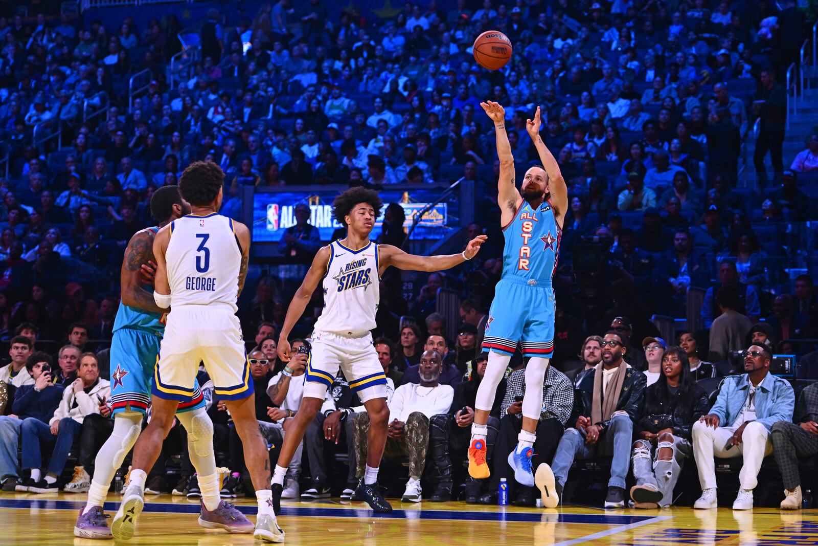 Shaq's OGs' Stephen Curry shoots a 3-point basket while playing the Candace's Rising Stars during Game 2 of the NBA All-Star basketball game in San Francisco, on Sunday, Feb. 16, 2025. (Jose Carlos Fajardo/Bay Area News Group via AP)