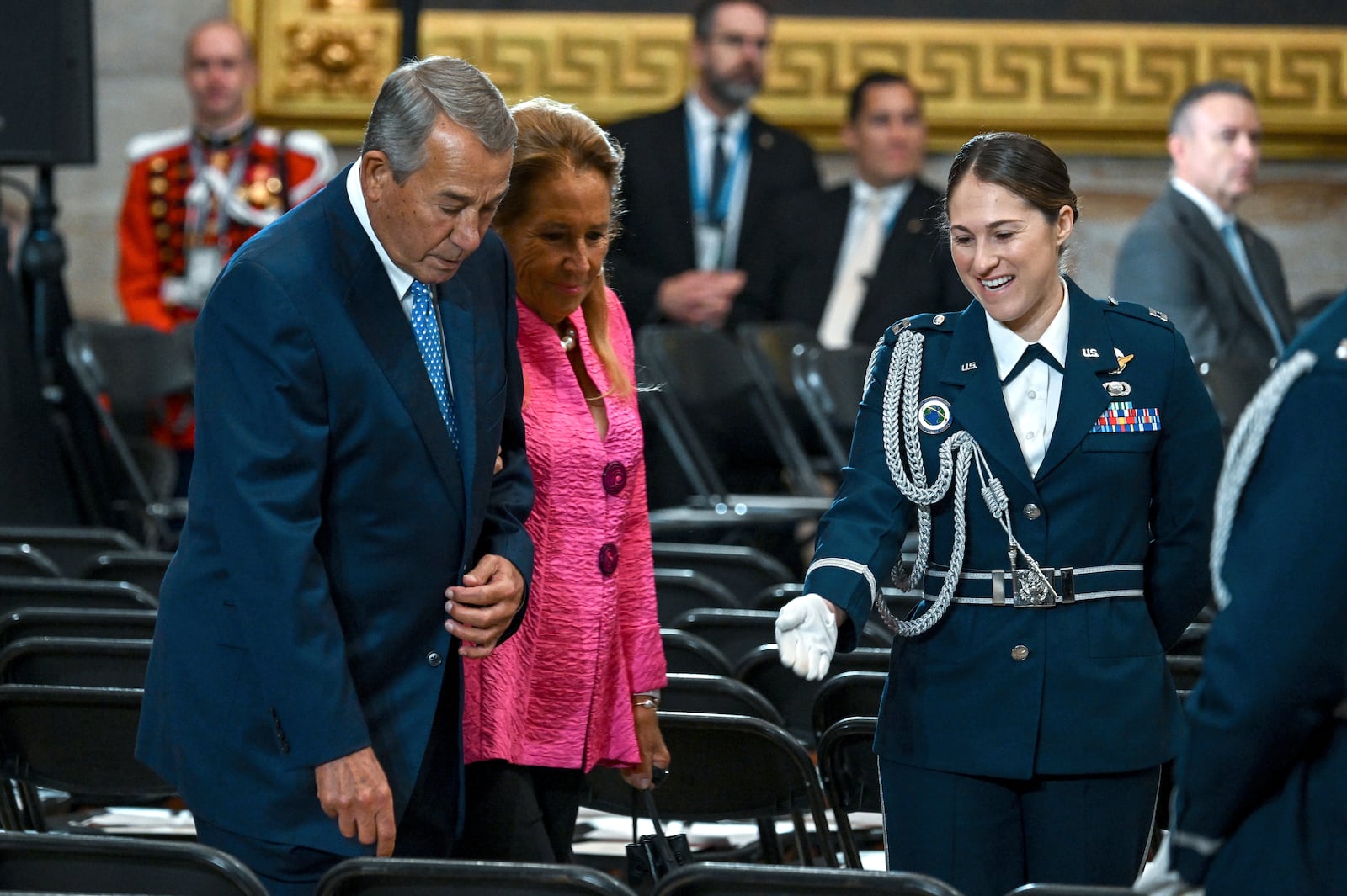 Former House Speaker John Boehner, left, and his wife Debbie Boehner arrive at the 60th Presidential Inauguration in the Rotunda of the U.S. Capitol in Washington, Monday, Jan. 20, 2025. (Kenny Holston/The New York Times via AP, Pool)