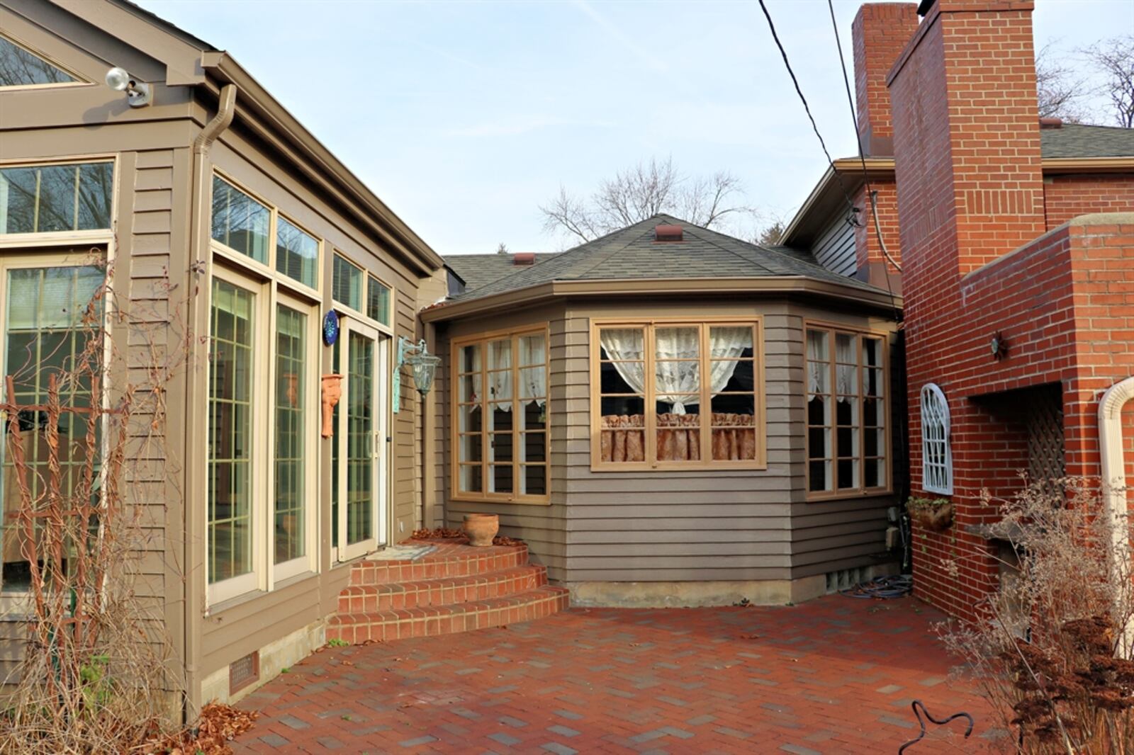 The Florida room offers access to the paver-brick patio and built-in planting station. CONTRIBUTED BY KATHY TYLER