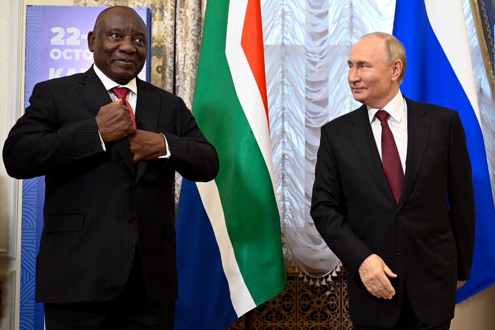 Russian President Vladimir Putin, right, and South African President Cyril Ramaphosa on the sidelines of BRICS Summit at Kazan Kremlin in Kazan, Russia, Tuesday, Oct. 22, 2024. (Alexander Nemenov, Pool Photo via AP)