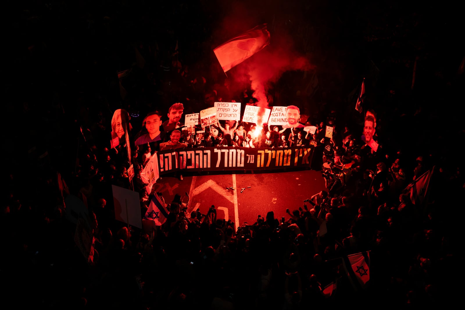 People take part in a protest demanding the immediate release of hostages held by Hamas in the Gaza Strip, in Tel Aviv, Israel, Saturday, March 15, 2025. (AP Photo//Oded Balilty)