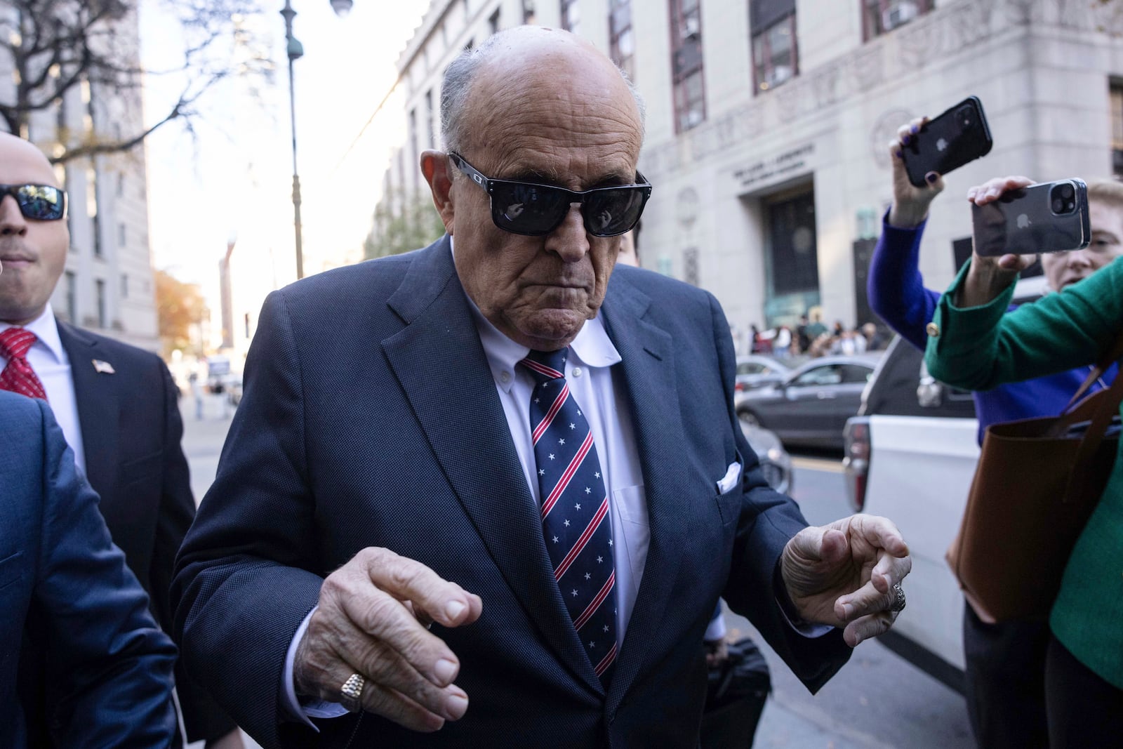 Former New York City Mayor Rudy Giuliani arrives at the court to explain to a federal judge why he hasn't surrendered his valuables as part of a $148 million defamation judgment, in New York, Thursday, Nov. 7, 2024. (AP Photo/Yuki Iwamura)