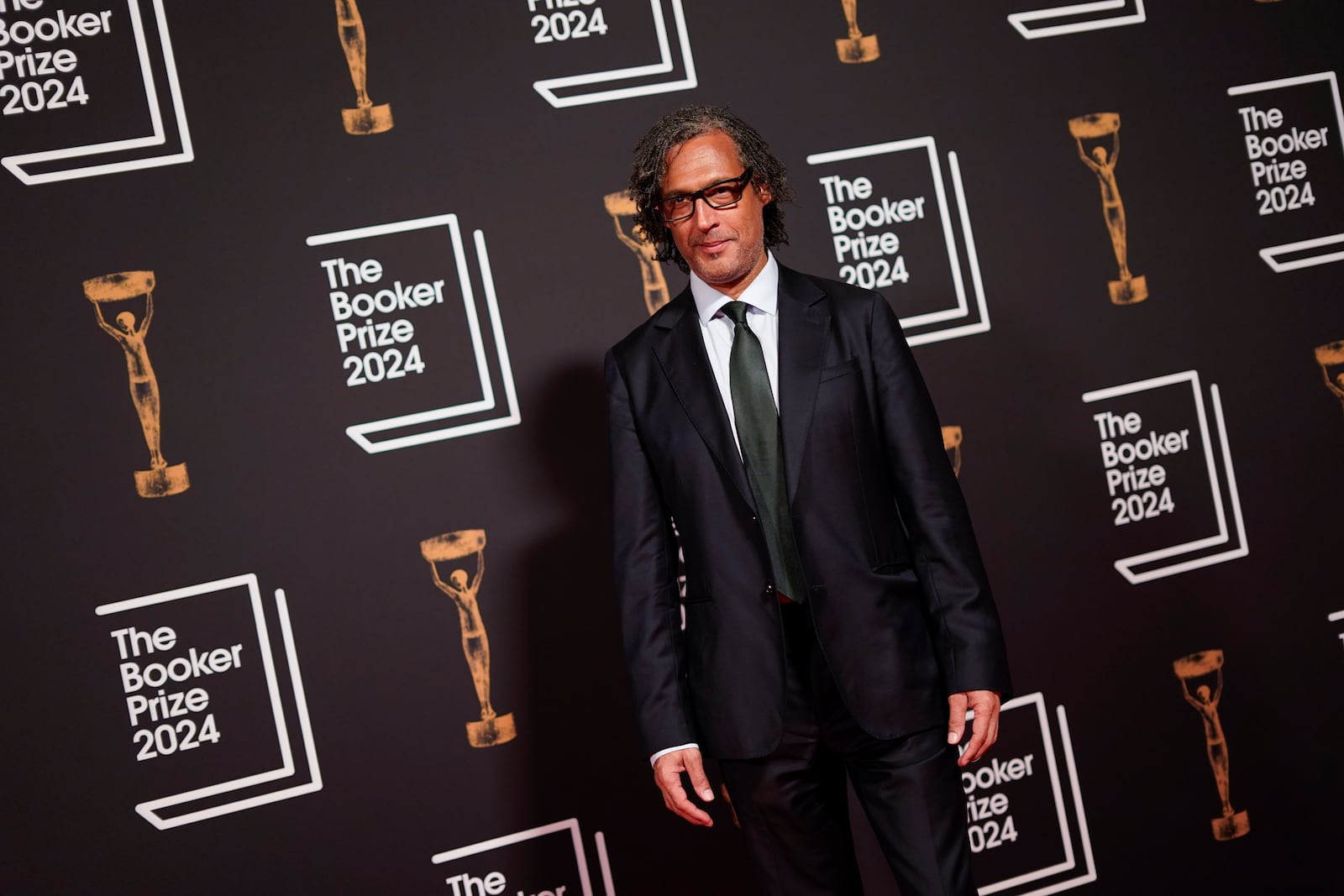 David Olusoga arrives at the Booker Prize award dinner in London, Tuesday, Nov. 12, 2024. (AP Photo/Alberto Pezzali)