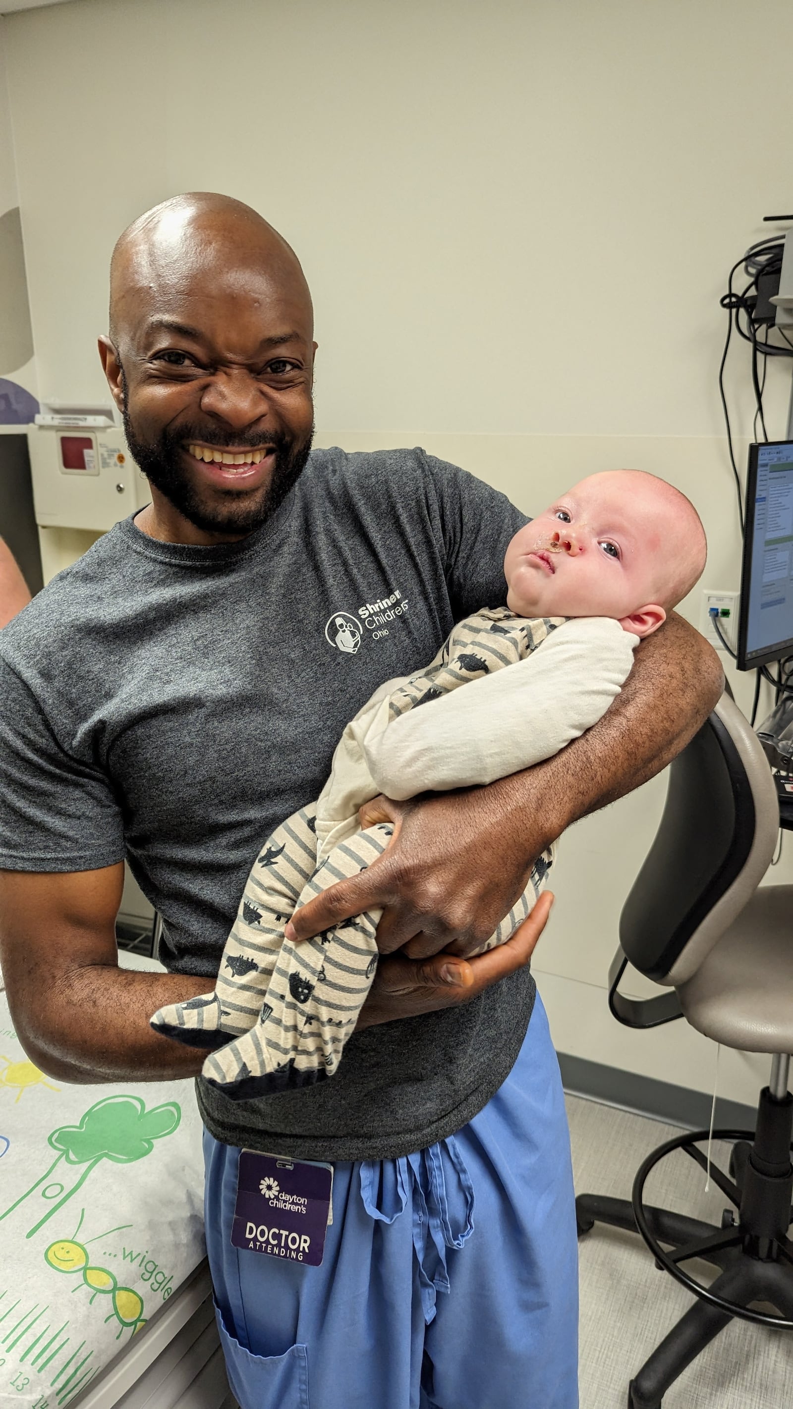 Dr. Salim Mancho, a plastic surgeon with Shriners Children's Ohio, with his patient, Case Lauf, of Springboro. Mancho completed a successful surgery on Case for his cleft lip in May 2023. CONTRIBUTED