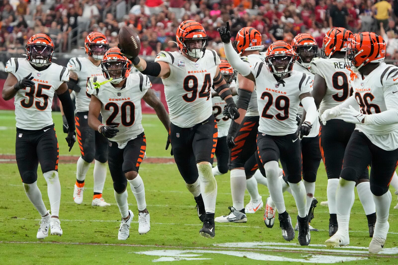 Cincinnati Bengals defensive end Sam Hubbard (94) celebrates his fumble recovery against the Arizona Cardinals during the second half of an NFL football game, Sunday, Oct. 8, 2023, in Glendale, Ariz. (AP Photo/Rick Scuteri)