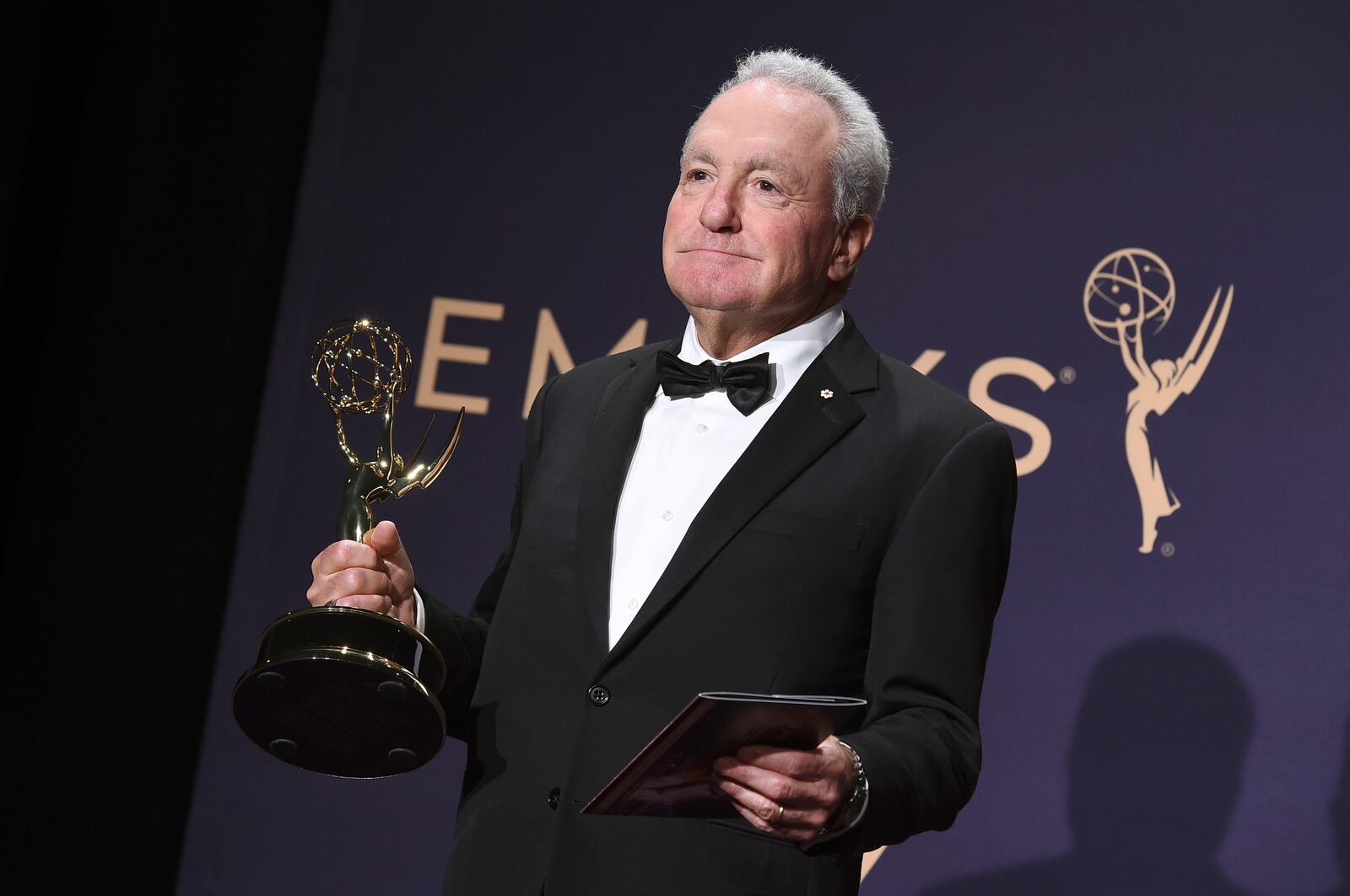 FILE - Lorne Michaels poses in the press room with the award for outstanding variety sketch series for "Saturday Night Live" at the 71st Primetime Emmy Awards on Sunday, Sept. 22, 2019, in Los Angeles. (Photo by Jordan Strauss/Invision/AP, File)