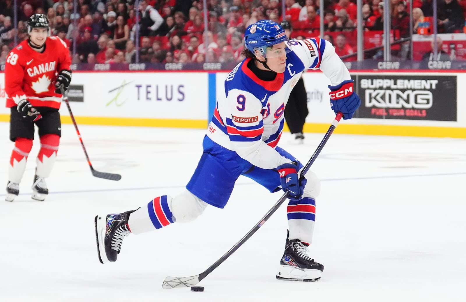 United States' Ryan Leonard (9) shoots against Canada during the third period of an IIHF World Junior Hockey Championship tournament game in Ottawa, Ontario on Tuesday, Dec. 31, 2024. (Sean Kilpatrick/The Canadian Press via AP)