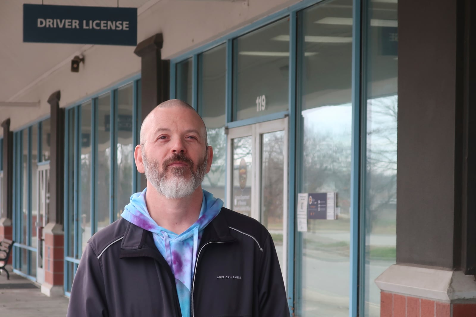 Steven Fish, of Garnett, Kan., returns to the strip mall where he tried to register to vote in 2014 but couldn’t because of a proof-of-citizenship requirement later struck down by the federal courts, Monday, Dec. 9, 2024, in Lawrence, Kan. (AP Photo/John Hanna)