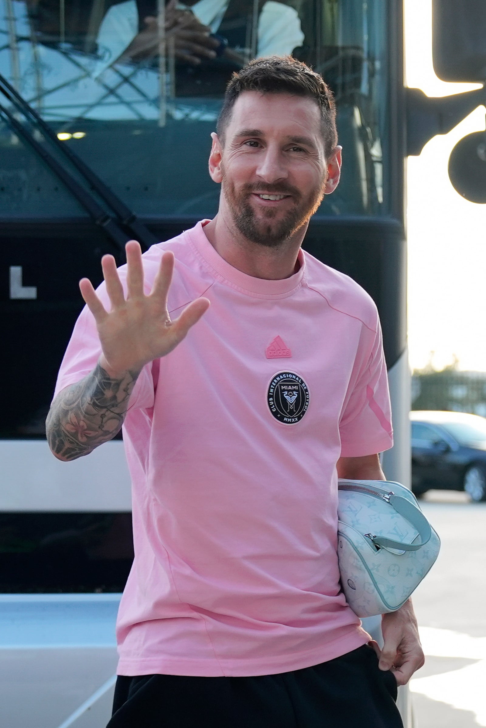 Inter Miami forward Lionel Messi waves as he arrives for an MLS soccer match against Charlotte FC, Saturday, Sept. 28, 2024, in Fort Lauderdale, Fla. (AP Photo/Rebecca Blackwell)