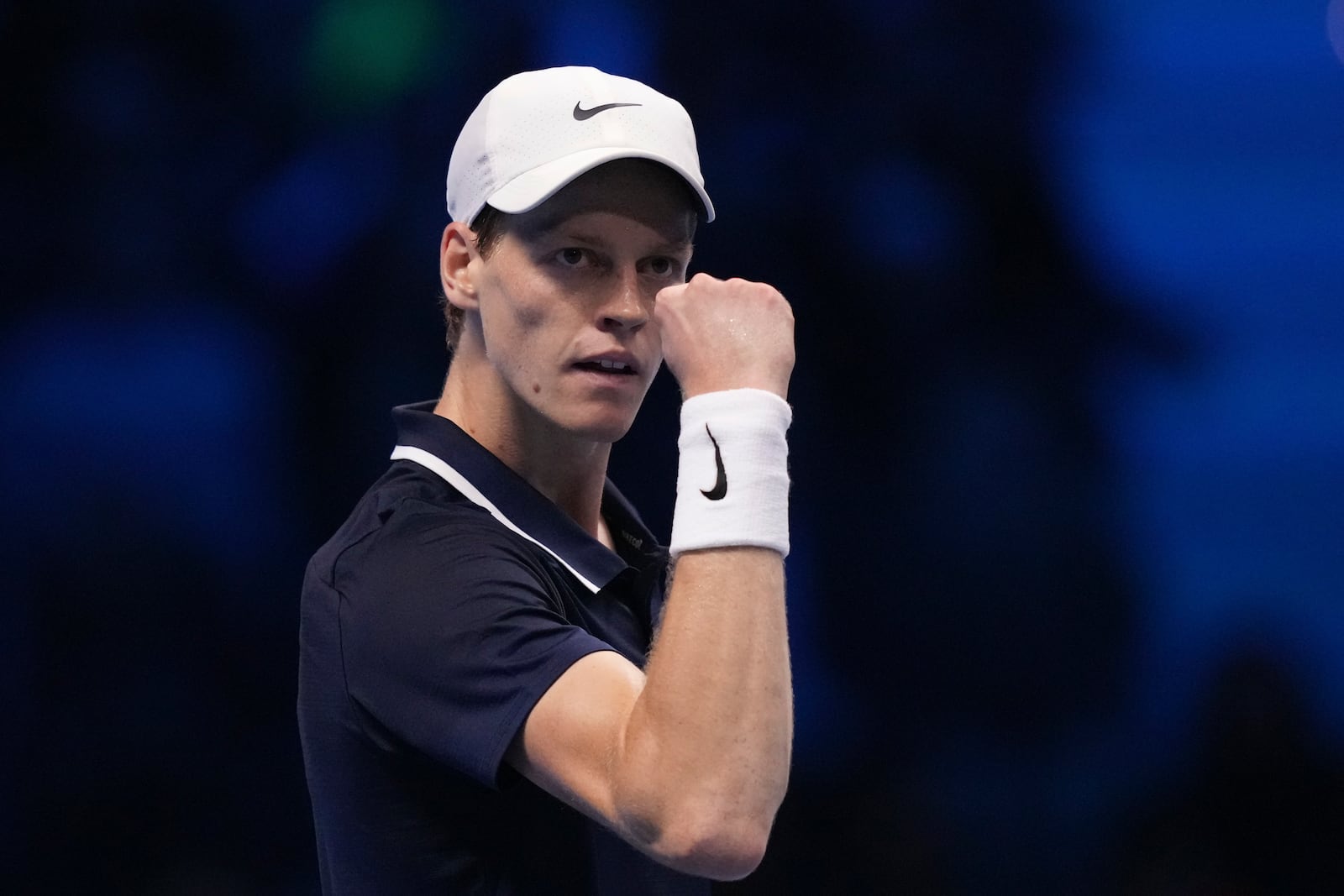 Italy's Jannik Sinner reacts during the singles tennis match of the ATP World Tour Finals against Russia's Daniil Medvedev, at the Inalpi Arena, in Turin, Italy, Thursday, Nov. 14, 2024. (AP Photo/Antonio Calanni)