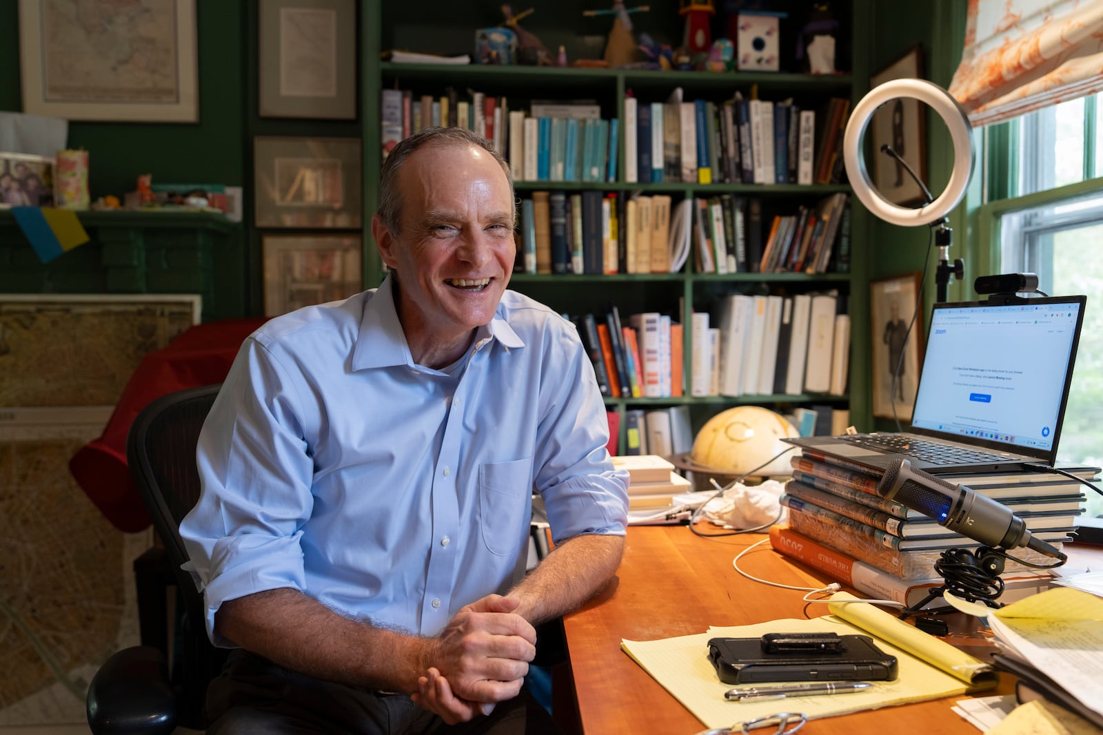 Economist Simon Johnson poses for a photograph after jointly winning the Nobel memorial prize in economics, at his home in Washington, Monday, Oct. 14, 2024. (AP Photo/Ben Curtis)