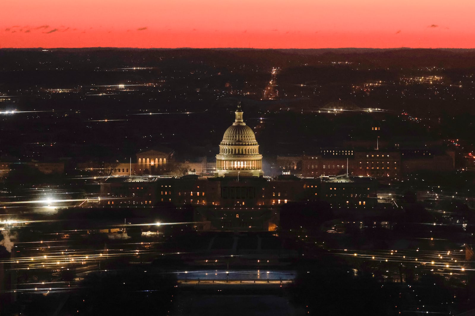 The U.S. Capitol is seen from the top of the Washington Monument at dawn on Inauguration Day, Monday, Jan.20, 2025 in Washington. (Brendan McDermid/Pool via AP)