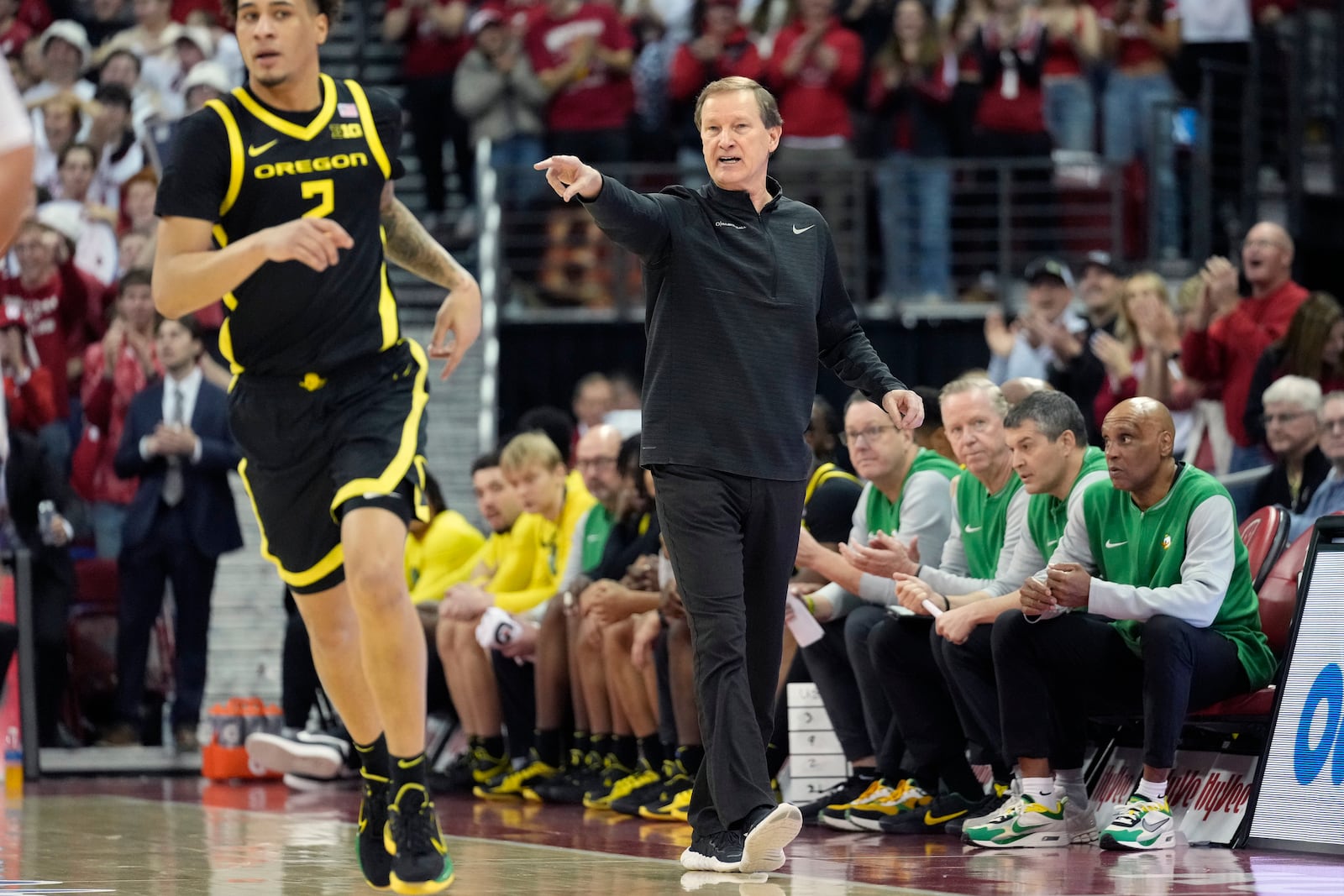 Oregon head coach Dana Altman instructs his player against Wisconsin during the first half of an NCAA college basketball game Saturday, Feb. 22, 2025, in Madison, Wis. (AP Photo/Kayla Wolf)