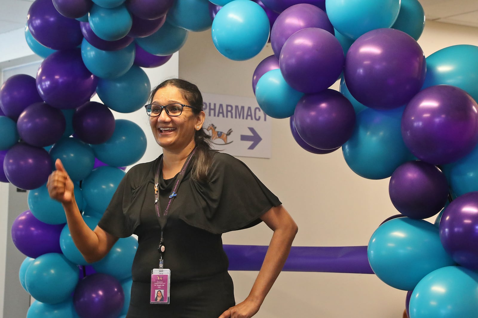 Dr. Yamini Teegala, medical director for the Rocking Horse Center, talks about how much the new Rocking Horse Pharmacy will help patients get the medicine they need Friday, June 24, 2022 during a grand opening ceremony. BILL LACKEY/STAFF