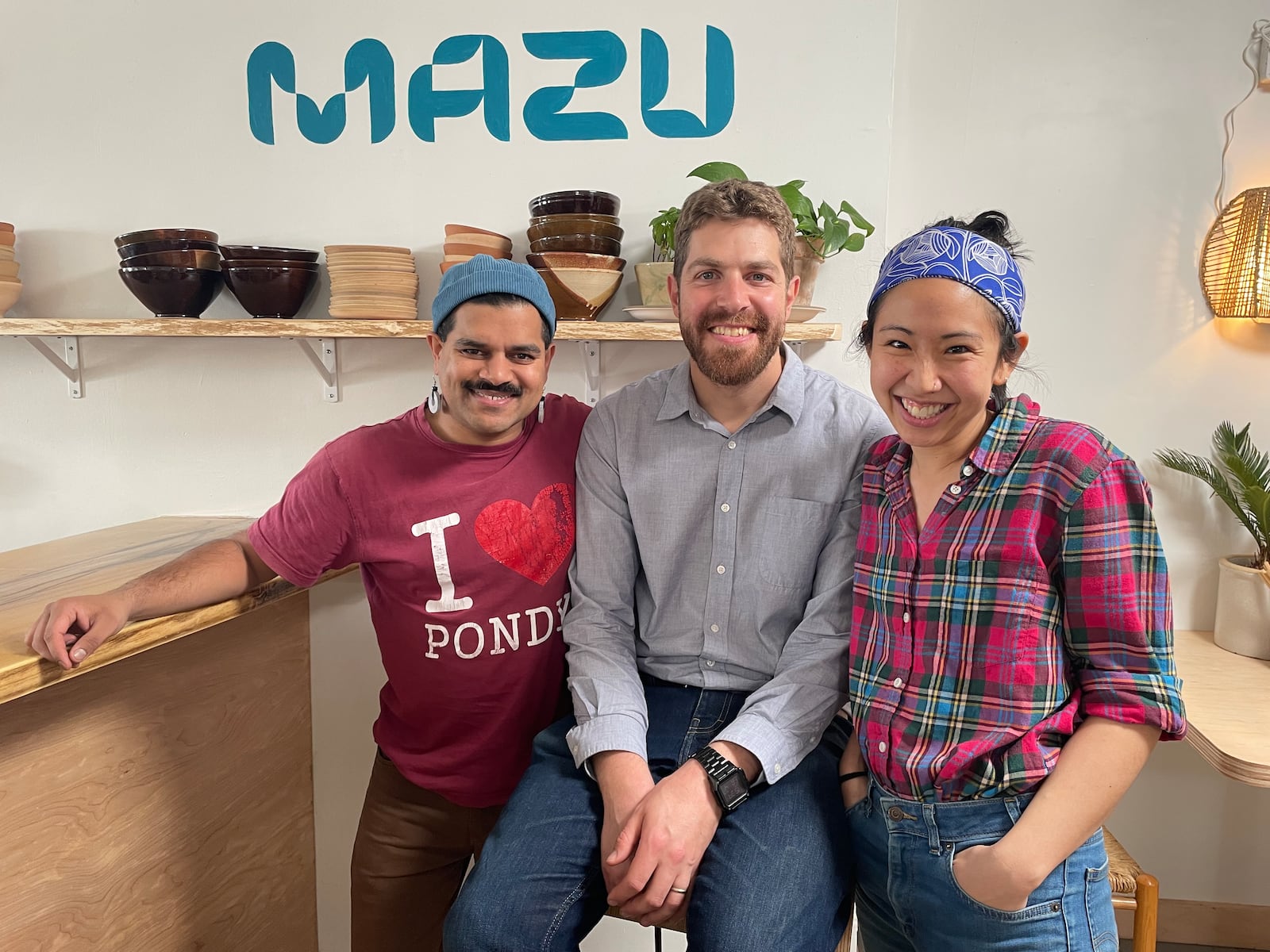 MAZU, a vegan restaurant inspired by Indian, Israeli and Taiwanese cuisine, is open at 229 Xenia Ave. in Yellow Springs. Pictured left to right: Owners Kumar Jensen, Matan Mazursky and Angie Hsu. NATALIE JONES/STAFF