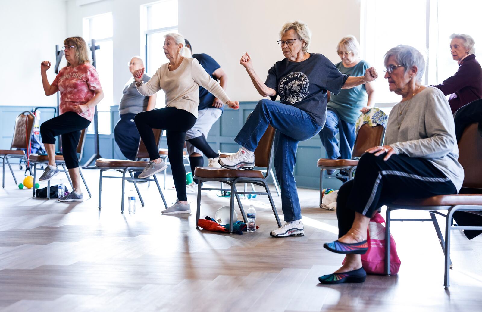 A group exercises during the SilverSneakers fitness class Wednesday, Oct. 12 2022 at Central Connections on Central Avenue in Middletown. Wellness coordinator Angie Millsap teaches the classes for older adults. NICK GRAHAM/STAFF