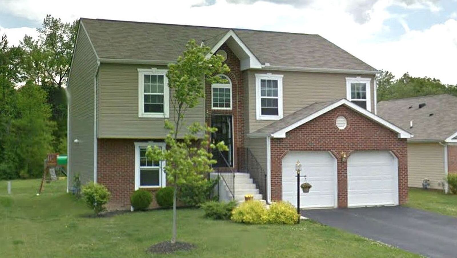 Pictured in a May 2012 Street View image is the Pataskala, Ohio, home where Noelle Elizabeth Massuros, 2, was shot to death Saturday, Nov. 14, 2019. The girl's father, Jason Massuros, 41, of is charged with endangering the welfare of children in connection with the shooting. (Google)