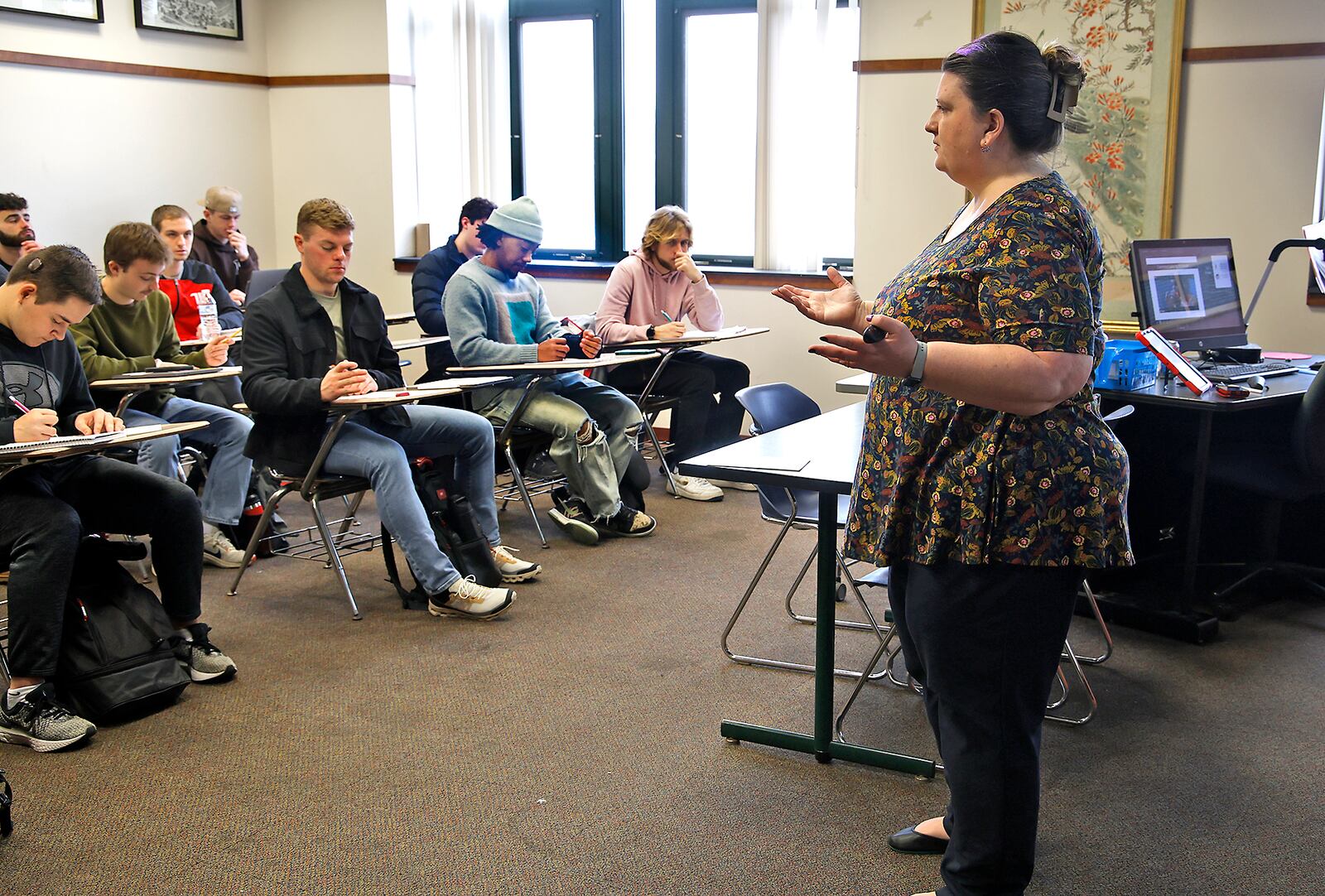 Kelly Dillon, associate professor of communications and digital media, teaches her media literacy class at Wittenberg University Friday, Feb. 16, 2024. BILL LACKEY/STAFF