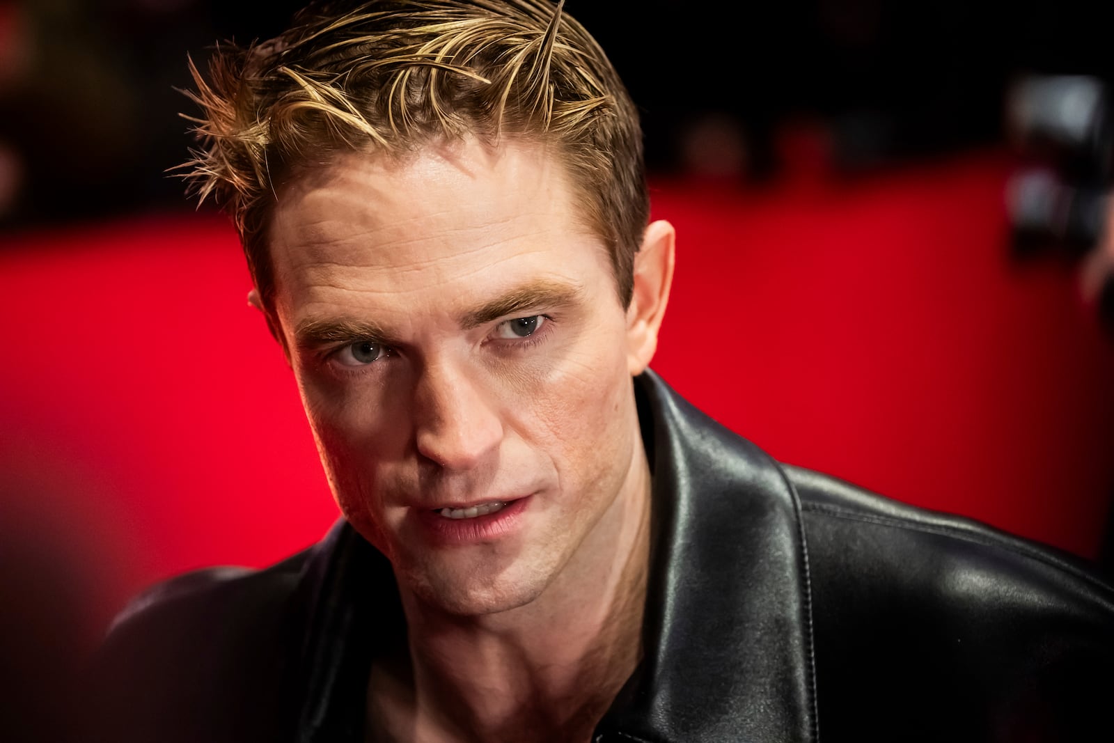 Actor Robert Pattinson poses for the photographers as he arrives for the screening of the film 'Mickey 17' at the International Film Festival, Berlinale, in Berlin, Saturday, Feb. 15, 2025. (Christoph Soeder/dpa via AP)