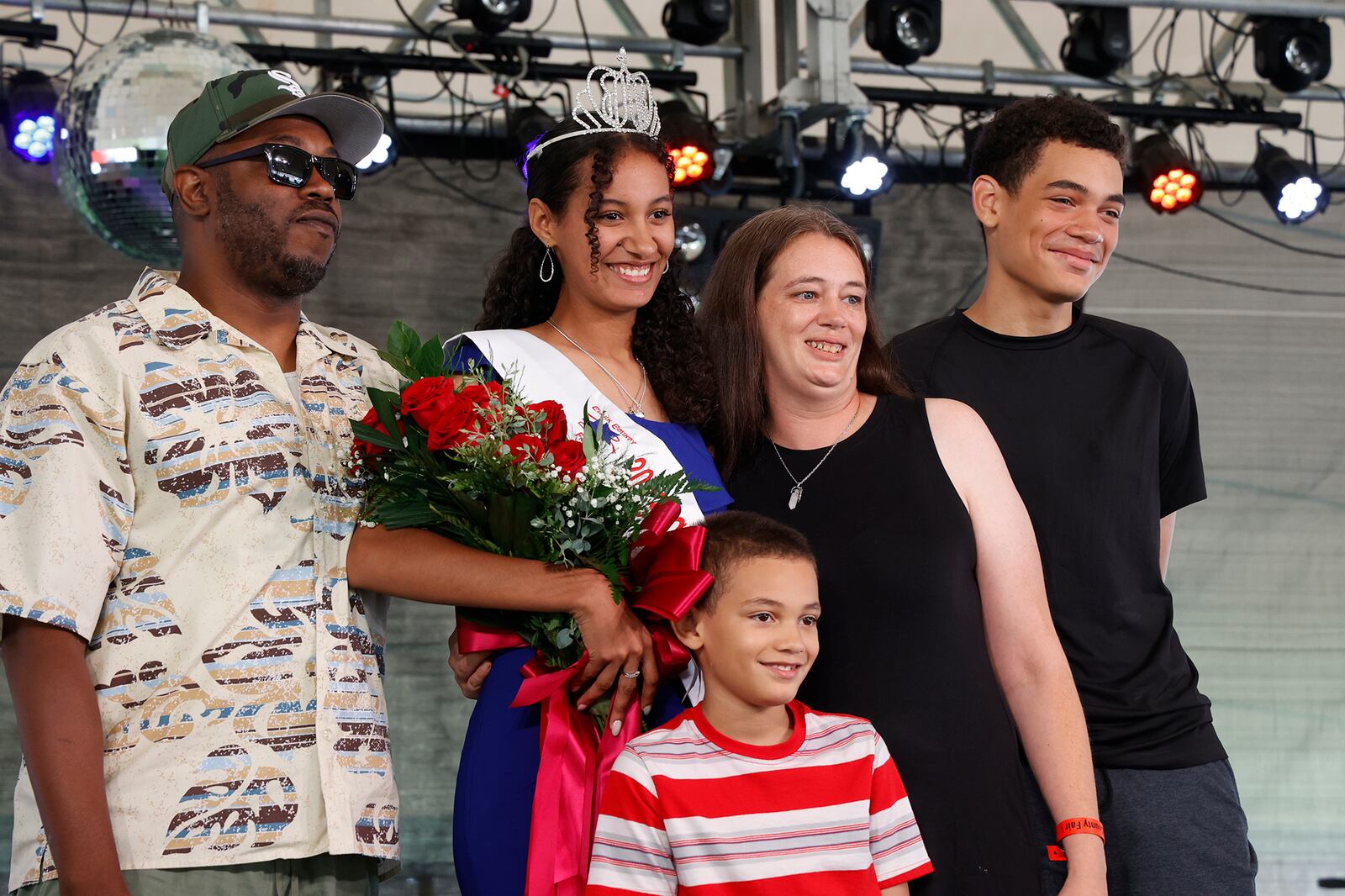 Chloe Gillaugh, the 2023 Clark County Fair Queen, with her family after being crowned Friday, July 21, 2023. BILL LACKEY/STAFF